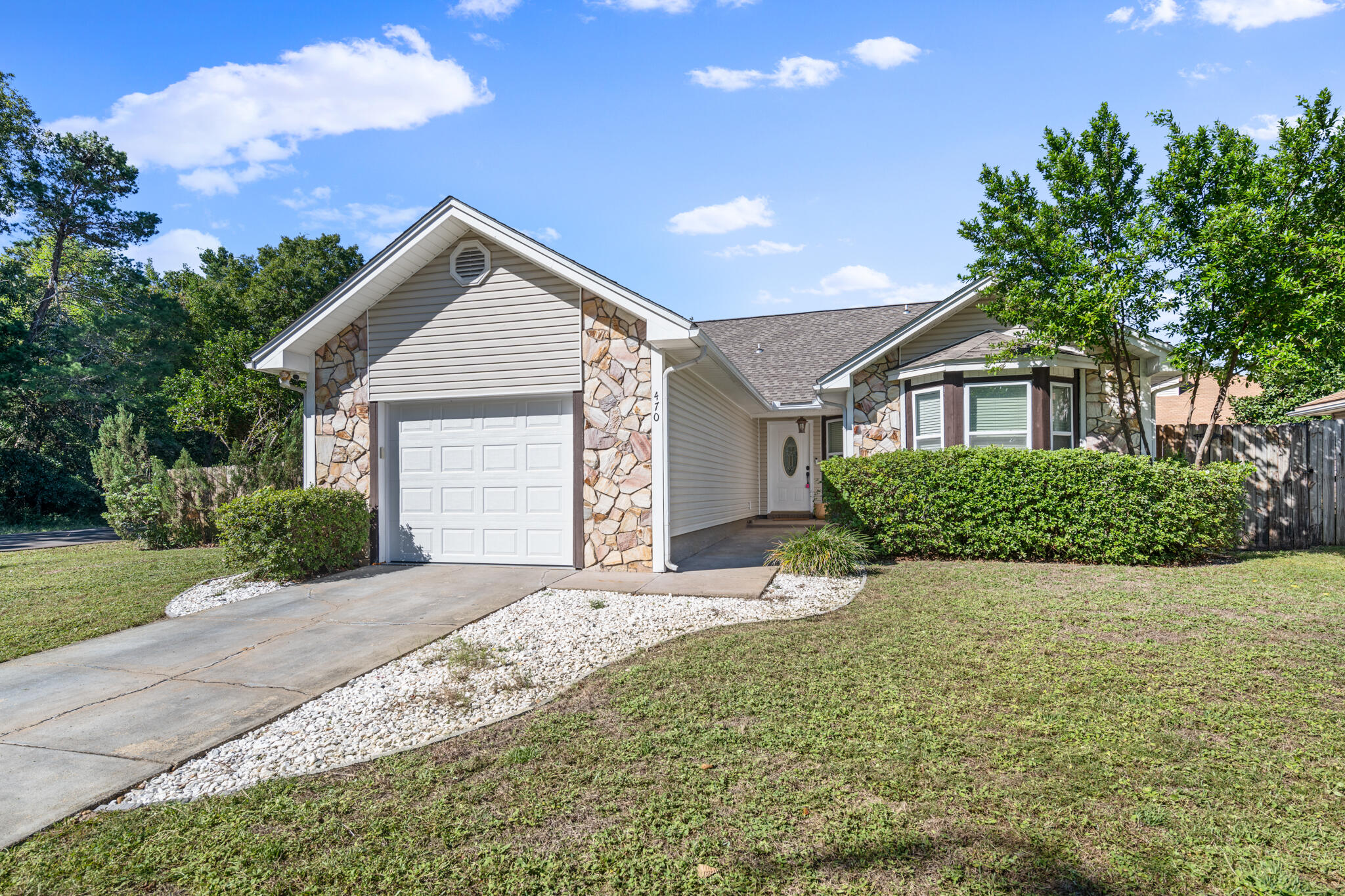 AVAILABLE NOW! This cozy, corner lot home is just minutes from Hurlburt Field AFB and Navarre Beach. It is ideally located close to restaurants and shopping and easy access to Hwy 98. The open concept floor plan creates by a warm, welcoming interior complete with a stone faced, wood burning fireplace. The relaxing backyard features an enclosed patio and flowering trees. Perfect for curling up with a good book in a hammock. You will love this wonderful community. NO smoking. 600 minimum FICO credit score required in addition to meeting rental criteria. Pets allowed upon approval with a non-refundable pet fee and with a Petscreening.com report.All applicants are required to complete an application on https://onefamilypropertyservices.petscreening.com/regardless of if they own a pet or not.