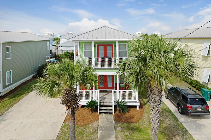 Investors Dream...$75k-$85k Annual Gross Rental Income, Potential of $85k-$110k w/ addition of a 5th/6th BR & 1/2 bath! Charming Crystal Beach cottage with Carriage Home located just -1/2 block to the beach, features a private pool, with NO HOA & ample parking for up to 5 cars. Public beach access just steps away-Shores of Crystal Beach or Shirah St. Completely updated with beach-inspired colors and decor. With fresh paint (inside and out), incorporating all the elements of true coastal living such as hardi-plank board siding, metal roof, bahama shutters, 9' ceilings, and lush landscaping. You'll love the spacious, open floor plan of the main house with tiled floors. The kitchen features brand new stainless steel appliances.
2 Master Suites & a double bunk room in main hou se. 3rd Master Suite is located in the detached carriage house sleeping a total of 16 guests with room for an expansion. The extra-wide hallway on the main floor is this comfortable, private bedroom. The well-appointed, full bathroom is adjacent to this bedroom. The second Master bedroom is located upstairs. From this room, you can step out to your private second floor balcony to enjoy your morning coffee or relax after a day at the beach to capture "peek-a-boo" gulf views!  The master bathroom features an extra-large vanity with double sinks and drawers, bathtub and separate shower. The other bedroom on the second floor is this super-size bunk room featuring two full-over-full bunks (that's 4 full-size beds) PLUS a queen bed. Inside the carriage house you'll find a comfortable living area and another master suite with a walk-in closet and full bathroom.This Crystal beach cottage offers a huge fenced in private backyard, a very nice sized gunite pool with plenty of room for lounging by the heated pool, two outdoor dining sets and a grill to enjoy your family cookouts.