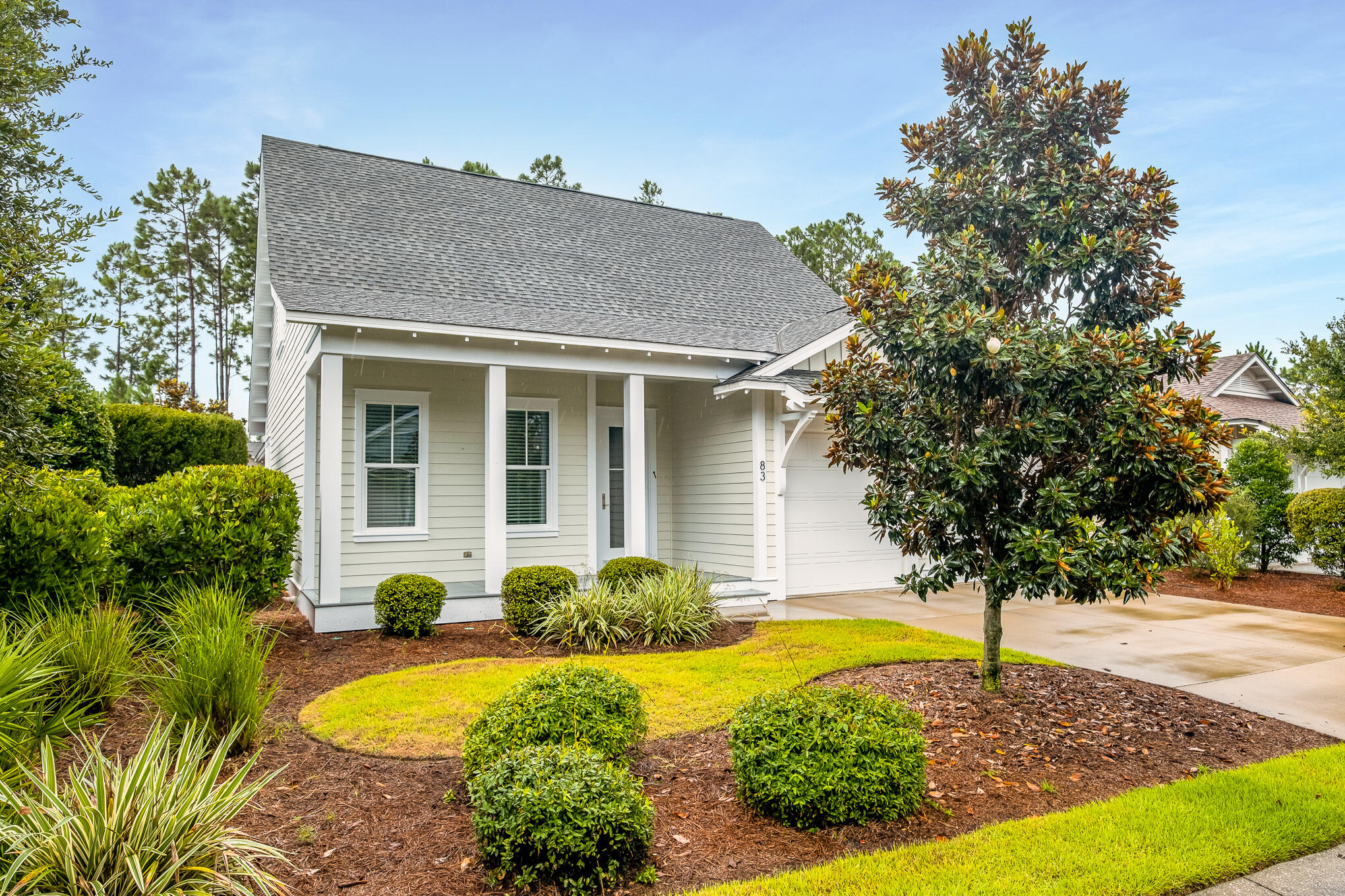 Welcome to 83 Somersault Lane where the master suite is on the main level with an additional suite with a private bath for guest or family. Upstairs, the 2 additional bedrooms share a Jack n' Jill bath. This home has plenty of space to convert one of the spare bedrooms Into a bonus area or home office or playroom or whatever your heart desires. Downstairs you'll also find the half bath and laundry area. This is a wonderful primary or second home! The kitchen boost of quartz countertops and beautiful wood flooring throughout, handcrafted tile, backsplash, under-mounted kitchen counter lights, crown molding, and other upgrades such as outdoor natural gas grill. This home has a freshly exterior and interior paint job.  This home is perfect for the family with children or for your retirement!