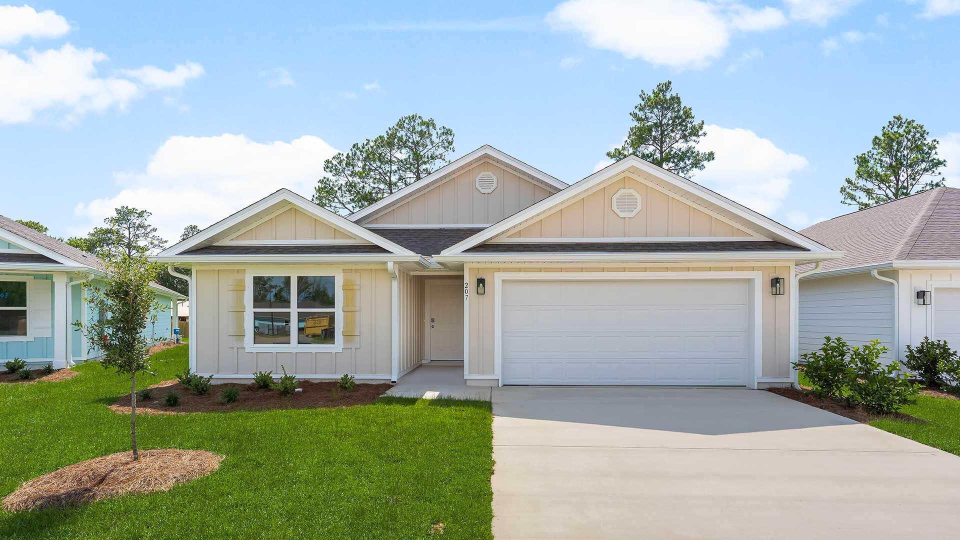 207 Eunola Lane, a new home at Ashton Park Phase III in Freeport Florida. This home is ready for move in and features four bedrooms and two full bathrooms as well as a two-car garage. As you enter this home you will find a bright hallway that leads to the expansive and open living area. The open concept design of this floor plan affords a comfortable living space. With windows along the back of the home and access to the outdoor patio, this space has plenty of natural lighting. This kitchen is equipped with stainless steel appliances including a smooth top stove, microwave and dishwasher as well as granite countertops. The primary suite is located at the back of the home where the ensuite bathroom features two large closets and a double vanity.