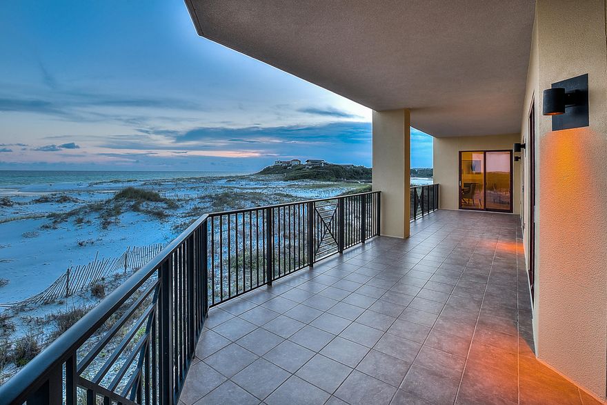 MAJOR PRICE REDUCTION - LAST DEVELOPER UNIT AT SANCTUARY BY THE SEA - This unique 3 bedroom 3 bathroom condominium home rests directly on the beach. Wake up every morning to the sound of the waves and the Emerald waters with Gulf views from both the Master bedroom and Second Guest bedroom. This open, spacious, gourmet kitchen, with professional Viking appliances is a dream for parties and family gatherings. Sanctuary by the Sea also has 650 feet of exclusive beach frontage, 3 large pools, a fitness center, covered parking, and is a gated community with 24 hour security. ''Sanctuary'' is the only appropriate adjective one can use to describe this luxurious and stunning condominium and development. Call today to to make your appointment to see this gorgeous home