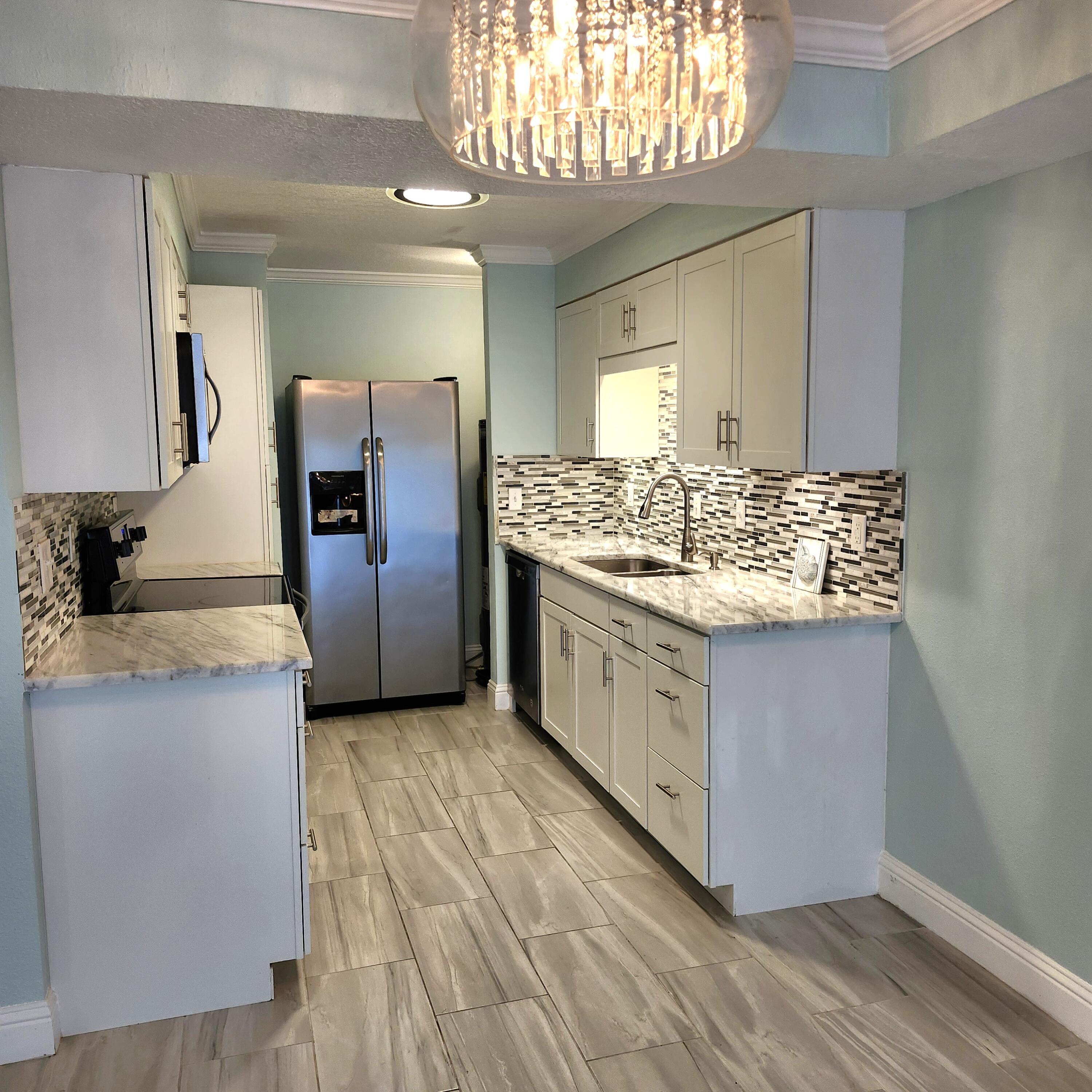 Don't miss this beautifully renovated unit in a waterfront complex. Located on the Intracoastal Waterway this complex offers a dock, fishing, waterfront pool and small craft storage. Launch your canoe, kayak or waverunner from the shore and enjoy the Florida lifestyle. Pretty walk-in tile shower. Modern kitchen features granite counters and glass tile backsplash. Newer windows and sliding door. Fantastic waterfront with a large grassy area and mature trees for shaded picnic area. Convient to Hurlburt, Eglin and the white sand beach of Okaloosa Island and Destin. Owners can have 2 pets weighing 20 lbs or less. This unit would make a great home or investment with short term rentals allowed. Come see one of the nicest units in Cedars Condominium complex.