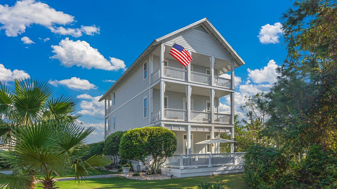 Gorgeous Beach Home! Meticulously upkept and beautifully upgraded 4 Bedroom/4 Bath coastal beauty offering over 1,000 sq ft of outdoor balcony living space and an excellent location close to the Grand Community Pool and fronting over 20 acres of Cypress Breeze Conservation Land! Sold partially furnished with stainless steel kitchen appliances, washer/dryer, custom window treatments and lighting, and high ceilings, crown moulding, beautiful cypress wood floors, spacious living area, large bedrooms and large elegantly adorned bathrooms with exquisite faucets & fixtures, ornate tile and glass showers, and the top floor Grand Suite with vaulted cypress wooden ceiling, luxurious bathroom, and enormous balcony is simply stunning! Coastal Living at it's finest! See Virtual Tour in Photos section!
