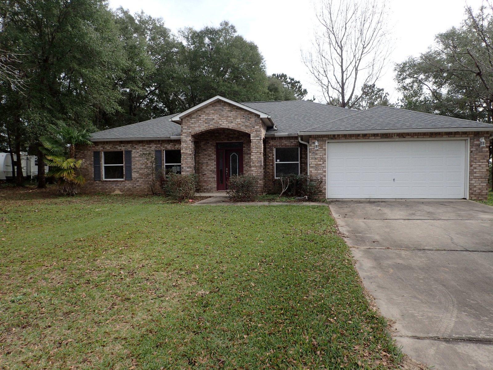 This REO auctioned home is surprisingly well kept! Just built in 2007, this all brick home is over 2000sf and has 3 bedrooms, 2 baths, separate dining area and is quite accommodating. Located in a bustling subdivision and surrounded by home built in similar construction and similar time frames. 2 car garage for parking or put an extra workshop or storage building on this 1/2 acre lot. Priced to sell, this home will move at this price and condition. Call today to see this jewel! Sellers asking price: 128,934.00