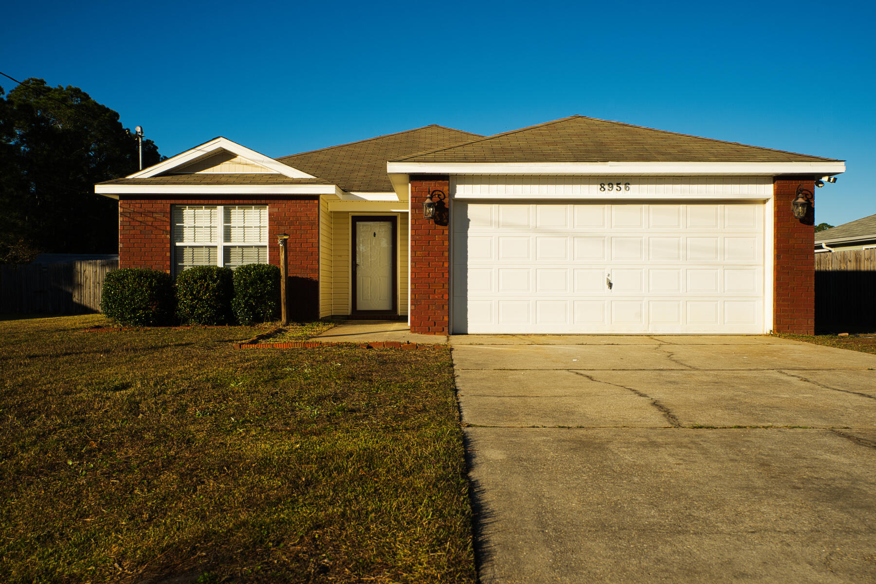 Welcome home! This beautifully updated 3-bedroom, 2-bathroom home in Navarre is move-in ready! Featuring a newly renovated kitchen with modern finishes, stunning new flooring throughout, and fresh paint that brightens every space. The open floor plan offers seamless flow from the kitchen to the living and dining areas, perfect for entertaining. Spacious bedrooms provide comfort, while the primary suite boasts an ensuite bath for added privacy. The open backyard is ready for summer BBQs or relaxation. Just 4 miles from Navarre Beach, close to local shopping, and ''A''-rated schools--don't miss this gem! Schedule your showing today!