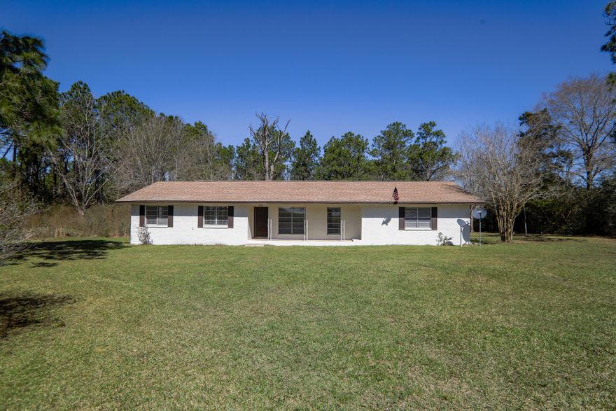 ANOTHER BAY LIVING INC PROJECTPRICED TO SELL FOR 15.6 ACRES**BEST DEAL ON 15.6 ACRES AND ALL REDONE BRICK HOME***Seller will add closet to make bonus room a 4th bedroom***-4/2 Brick home on 15.6 Acres- 575 Feet Road Frontage- This home has been completely remodeled- New Paint in and out, new fans and lights, updated kitchen with granite,back splash and stainless steel appliances,new lights and fans, updated baths,copper wiring,roof and ac in good shape and new split unit in family room addition, 2 Ac Units, landscaped, Priced to sell.. Shed sold as is --