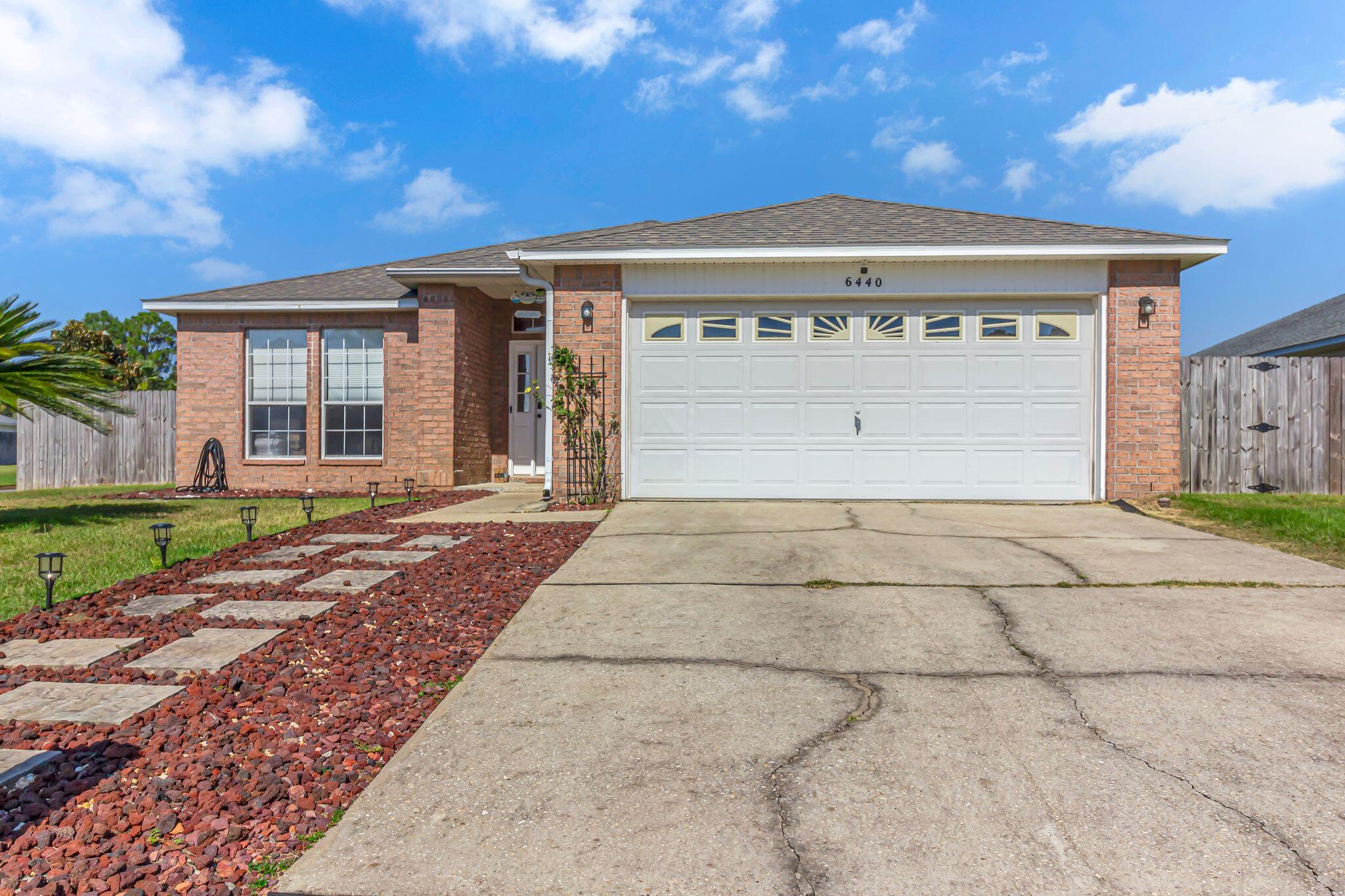 Welcome to this charming 3-bedroom, 2-bathroom home in Gulf Breeze, FL. This house features a fenced yard for added privacy and security, as well as solar panels to help you save on energy costs. Enjoy the convenience of tile floors throughout the home, perfect for easy cleaning and maintenance. The covered patio with a fan is ideal for relaxing outdoors, while the breakfast bar provides a great space for casual dining. Located just minutes from the beach, this home offers the perfect blend of comfort and convenience. Don't miss out on this wonderful opportunity to make this house your new home!Call 850-729-0399 View rental requirements or apply at www.RentwithBSR.comNo smoking or vaping. Pets may be allowed with some restriction and a $400 non-refundable pet fee.