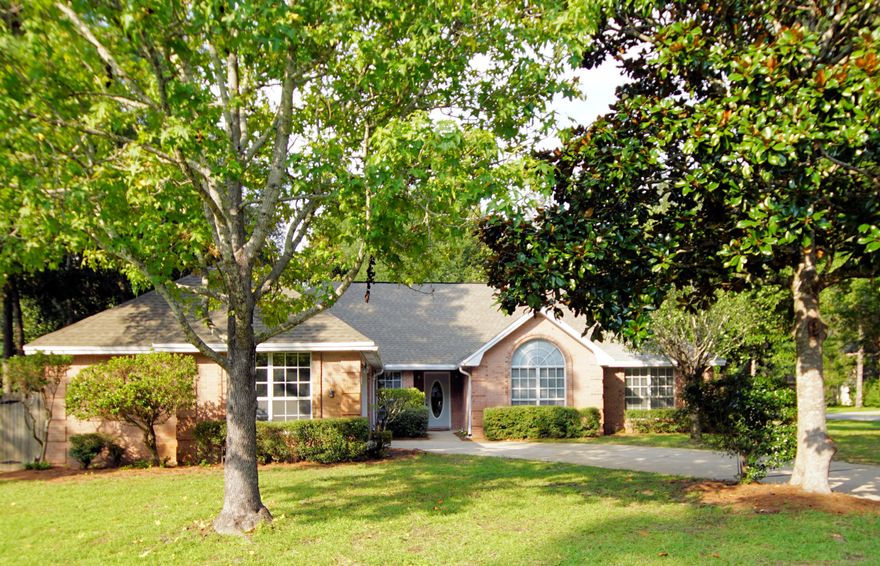 Wonderful Windward home on a private .43 acre corner lot in the community of Bluewater Bay. This home is light and bright with high ceilings and an open floorplan featuring two living areas. When you enter through the wide foyer, you will find the dining room to the left and the living room straight ahead. Adjoining the living room is the family room that is open to the large kitchen and breakfast area. The good sized bedrooms are located on the other side of the house for maximum privacy. This home has been freshly painted, the carpet is only a year old and there are new stainless appliances in the kitchen. The large, fenced corner lot with a double gate is great for both kids and pets and would be perfect for a future pool. This home in the private gated community of Windward