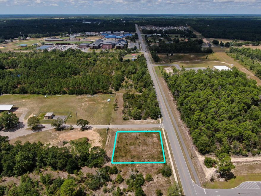 Interesting commercial opportunity on Walton Rd. near schools, churches, an assisted living facility, stores, parks and numerous businesses such as a funeral home and veterinarian. Zoned C-1, this nearly half acre (150x140) lot has many possibilities. Owners had originally planned to open a daycare facility years ago. It is already cleared and level, ready for your construction or business. It's rare for a well located and modestly sized lot to come on the market, so don't wait to seize this opportunity. No utilities on site and electric, city water and city sewer area available.
