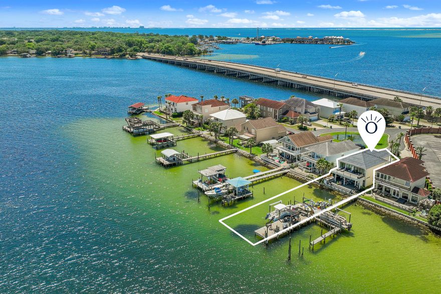 Wake up to the water, step onto your dock, and head out whenever the day calls.Behind the gates of Lighthouse Pointe, this renovated waterfront home is designed for easy Florida living, where time is spent outside and on the water. With two boat lifts, a jet ski lift, and walk-out access to the bayou, spontaneous swims, paddle sessions, sunset cruises, and quick trips to Crab Island become part of everyday life.Inside, the open layout invites natural light and water views throughout, creating a relaxed flow that connects living spaces to the outdoors. Step onto the Trex deck and outdoor kitchen--perfect for casual gatherings after a day on the water--then settle in by the outdoor fireplace as the evening breeze moves across the bayou.The primary suite is a private retreat overlooking the water, featuring its own fireplace, a soaking tub, and a spacious open showerideal for slow mornings and quiet nights. Thoughtful touches continue outside with a side yard for pets and a convenient doggie door, making it easy for four-legged family members to enjoy the space as much as you do.Whether you're pulling blue crabs from the trap for dinner, watching boats glide by, or simply enjoying the calm of the bayou, this home offers a lifestyle centered on the water. Located within the gated community of Lighthouse Pointe and conveniently close to Eglin Air Force Base, Hurlburt Field, and Fort Walton Beach Medical Center, this home combines a peaceful waterfront setting with easy access to everyday essentials.