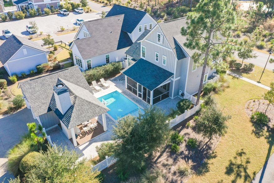 Real estate is all about location and this four-bed, three-and-a-half bath home in WaterSound Origins has that in spades. Located on a lot adjacent to a walking path and right across the street from Origins' community amenities, this home offers convenient entry and exit to the rental-restricted neighborhood and plenty of guest parking. Built in 2018, this 2,512-sq.-ft. upscale retreat has been thoughtfully curated both inside and out with designer lighting, wall coverings and wood flooring as well as a large screened porch, private pool with sun shelf and cabana with a gas fireplace and television for relaxing out of the sun.