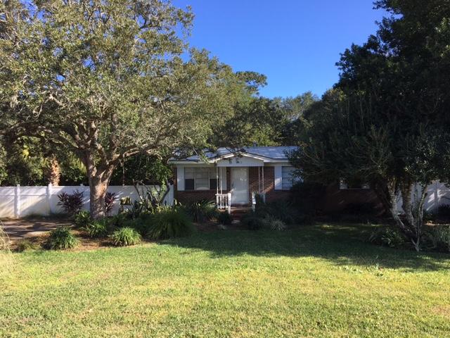 Charming ALL brick home just blocks from Destin Elementary in one direction and to the Mattie Kelly Park and Nature Walk or Joe's Bayou Boat Launch in the other. This beautifully landscaped home has a large fenced in backyard with irrigation system, renovated kitchen with new cabinets, upgraded lighting and granite counter tops. Tile throughout living areas and brand new carpet in bedrooms! New metal roof installed in 2011. New HVAC Apr/2015.