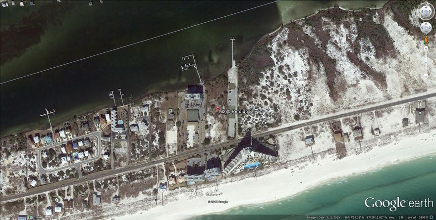 Parcel located on the intracoastal waterway with 273'of deep water frontage and 283'of road frontage along Perdido Key Drive next to Perdido Key State Park with gulf views. Zone COM-PK (Perdido Key Commercial District). Previous Development Order not active(Perdido Mosaic) for 33,000 square feet of commercial and office space and 37 slip marina and a 9 unit condo development.