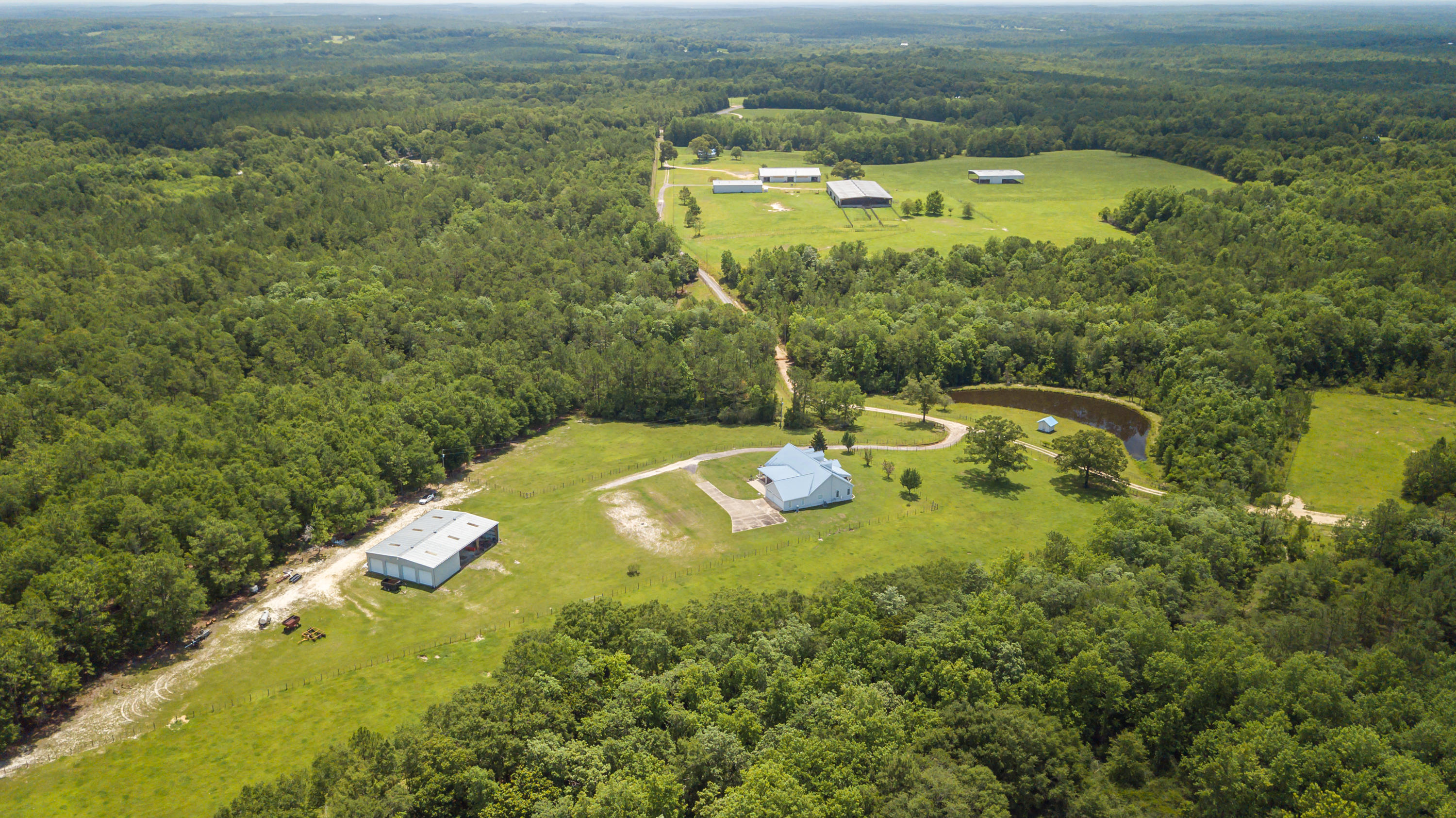 . S&S cattle ranch is one of the most premier working-Class A farms in the Southeast. A sprawling ranch encompassing 367 acres and featuring 8 large structures on a truly stunning landscape with rolling pastures, freshwater springs, winding roads, 3 ponds & a forest area that features hardwoods and an abundance of wildlife. Centrally located just 10 miles north of Defuniak Springs & highway I-10 and only 40 miles to the beautiful sugar sand beaches of the Emerald Coast. There are two homes located on the property the main home which is 3324 sq.ft plus a 3 car garage and the second home is the ranch hands home which features 1465 sq. Ft and 3 bedrooms + 2 bathrooms.
