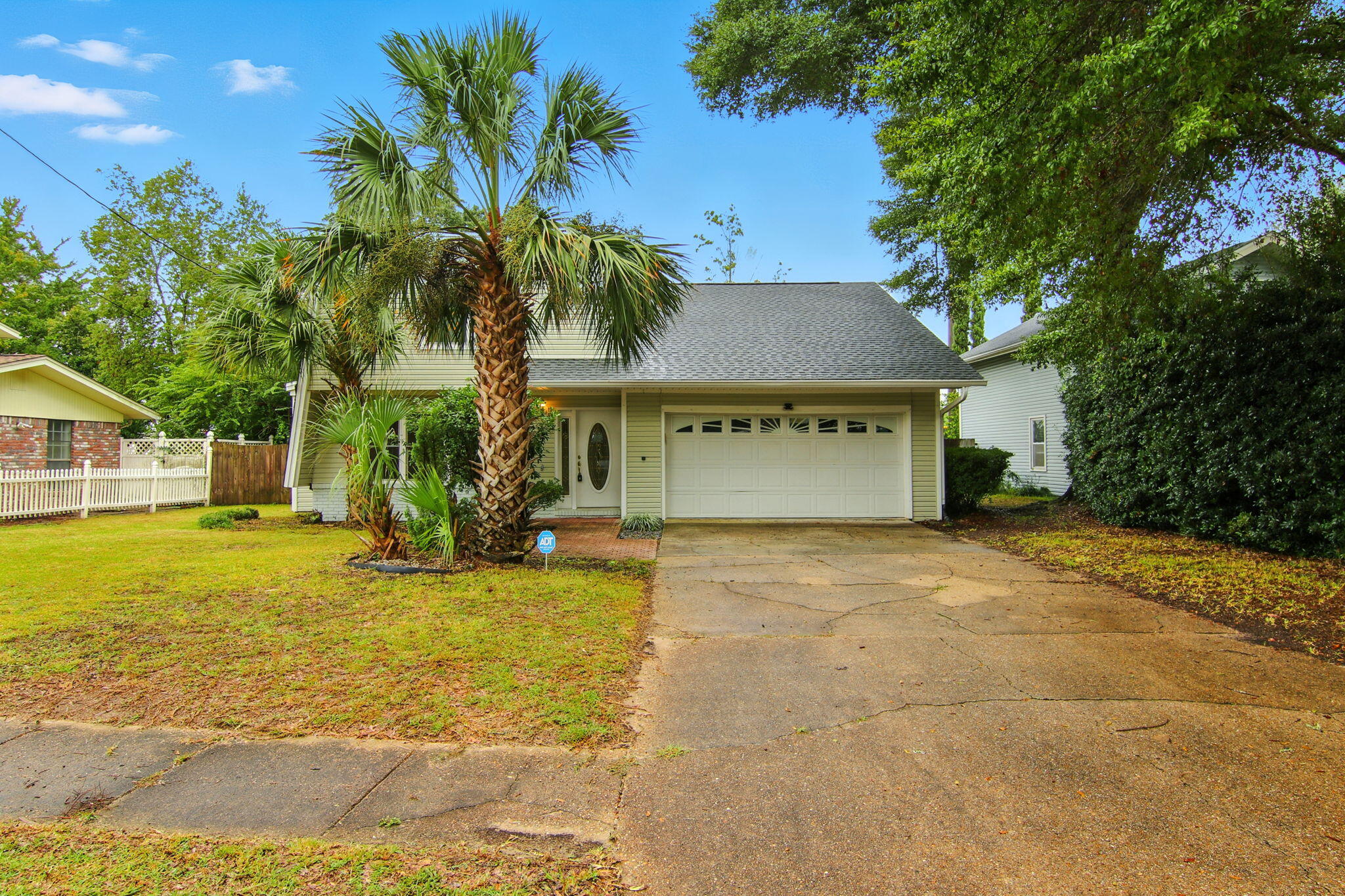 Welcome to this enchanting 4 bedroom, 2.5 -bath home! The sellers are motivated and offering a $10k credit for flooring or upgrades of your choice. Ideally located behind Choctawhatchee High School and close to shopping centers, this residence is just a quick 15-minute drive to beautiful Fort Walton beaches and 30A. Inside, you'll find a spacious kitchen and inviting dining area perfect for gatherings. The large living room creates a cozy atmosphere, while the backyard features a playground and ample space on the generous .22-acre lot. Upgrades completed in 2022 include a new roof, electrical sub-panel, and skylight window. Enjoy energy efficiency with solar panels that keep bills under $50. Additional enhancements include a new AC condenser, Wi-Fi-enabled water heater, modern appliance