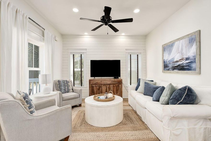 Three stories of updated beach living are offered right here at Satinwood Place. Located at the end of a quiet residential street just off Scenic Highway 30A, this lovely home is conveniently close to white sandy beaches on the beautiful Emerald Coast. The home has been well-maintained and has new furniture, upgraded bathrooms and flooring and new light fixtures so there's no ''to-do'' list. A paved driveway leads to a two-car garage. There's a connecting door to the mudroom and plenty of storage on this level. Head upstairs to the main living area where new wood-effect flooring flows through the bright and spacious family room. There's also a guest bedroom/ bunk room with an en suite bathroom. The well-planned chef's kitchen has ample white cabinetry complementing the stainless appliances