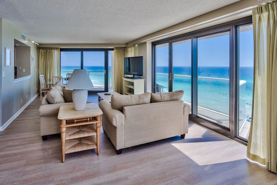 Coveted Floor plan-- This is a rare opportunity to own one of the best views of the Emerald Coast with a wrap around balcony featuring glass railings to take in all of the views. On a clear day see the coastline to the east all the way to Panama City and the coastline to the west all the way to Destin. Brand New luxury vinyl tile installed throughout in August featuring a wood look wide plank in coastal gray tones. The living and dining room are combined in a very generous space so that all of your family and friends can gather.  Wake up in the morning with views to the east in your master bedroom featuring an en suite bath.   Two guest bedrooms and a full bath complete this extraordinary condominium.  Beachside Two features covered parking, fitness room and pool with hot tub. All this and located within the gates of Sandestin Golf and Beach Resort with its emerald beaches, four golf courses, tennis, marina and The Village of Baytowne Wharf. Also conveniently located near the Market Shops, Grand Boulevard and Silver Sands Outlet mall to provide a host of shopping, entertainment and restaurants. 