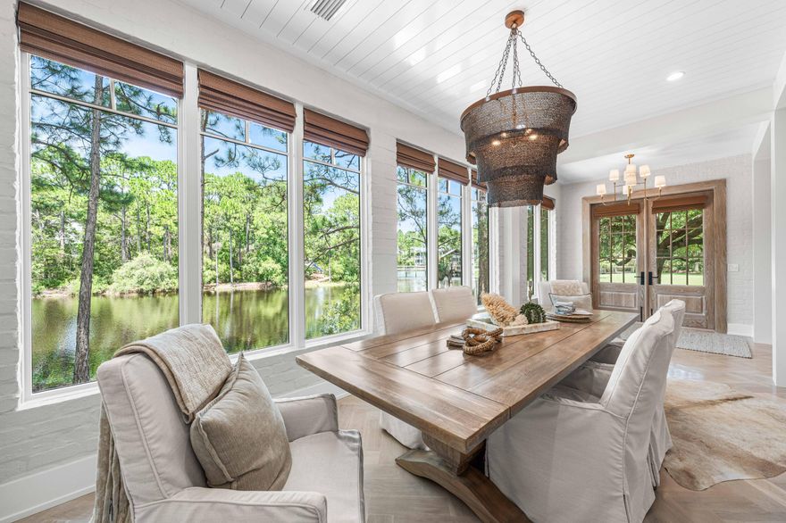 Welcome to 86 Lanier Lane, an exquisite lakefront home nestled in the heart of the enchanting Forest Lakes community. This stunning residence boasts an ideal location, surrounded by serene waters and adjacent to the neighborhood's lush green spaces. With a design that prioritizes breathtaking views, both the living areas and bedrooms offer picturesque sights of the lake, providing the perfect backdrop for your everyday life.Step inside to discover a seamless blend of luxury and comfort. The living and dining areas are beautifully appointed, making it an inviting space for relaxation and entertainment. The master bedroom provides an incredible opportunity to enjoy nature's beauty and tranquility at any hour.