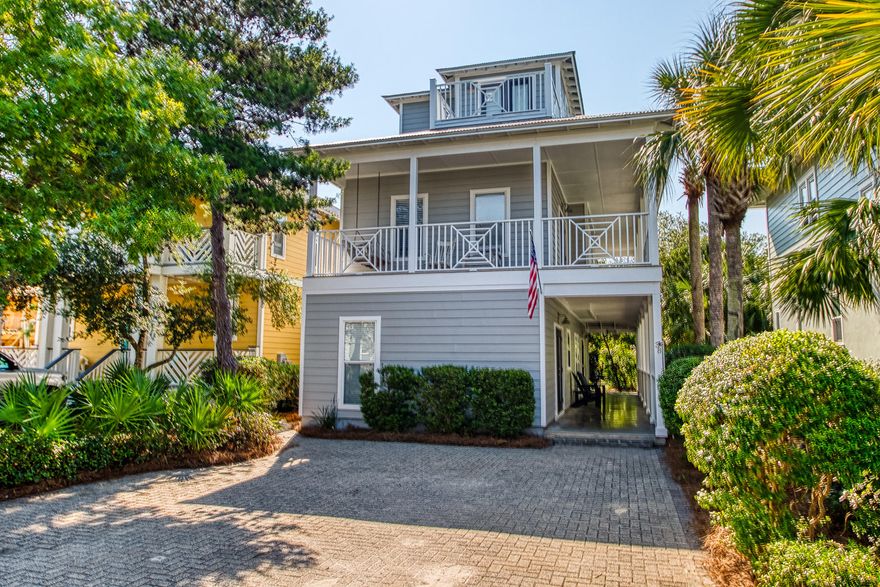 Newly refreshed Seacrest Beach home ideally located one block from the iconic community pool and backing up to picturesque green space. This classic Florida beach cottage has just been rejuvenated with fresh exterior and interior paint, new furnishings, and updated bathrooms  new photos coming soon! Sells turn-key ready for rental income or personal use with hardwood floors throughout, granite countertops, and stainless steel appliances. Approx. 975sf of covered porches, perfect for outdoor lounging or entertaining. A convenient 1st floor bedroom with full bath, a large master bedroom on the second floor with private bath, a third bedroom with en suite bath, plus a 3rd floor tower room with private deck and sleeping accommodations offer plenty of space and privacy.