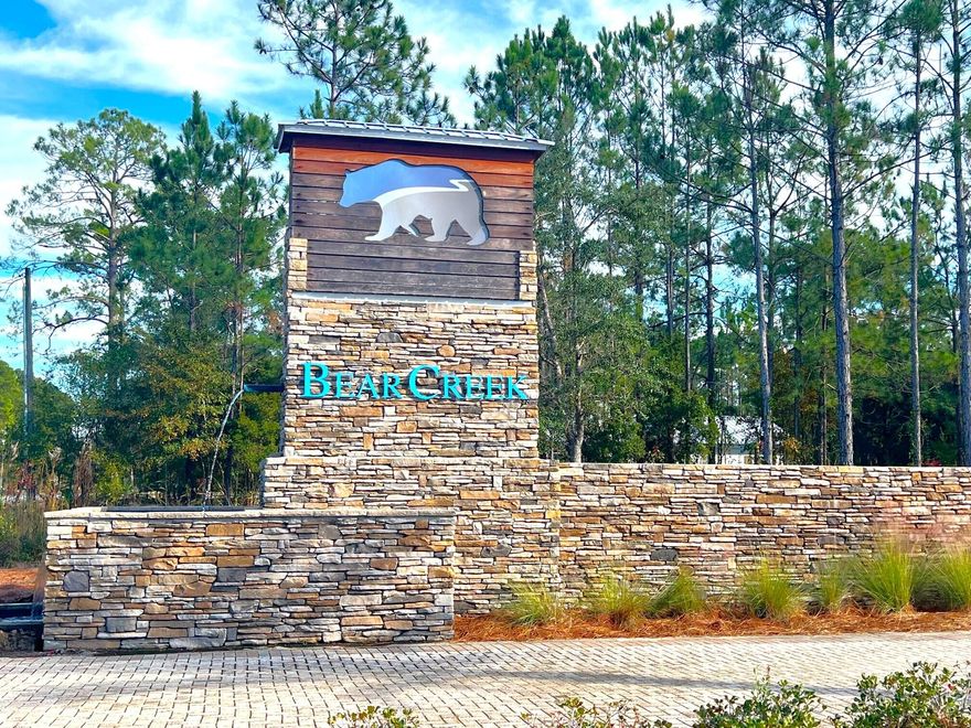 Don't miss your opportunity to purchase this prime lot in desirable Bear Creek Cottages subdivision (a gated community), off Hwy 3280. Spacious 1/4 ac lot located across from the common area, which features fitness center; playground; pickleball, basketball, tennis courts; The community pool is located just around the corner. Perfect neighborhood to build your dream home. Within 15 minutes to Windswept Dunes Golf Course and fishing at the Bay. Also within 30 minutes to the beaches of S Walton, shopping, dining, international airports and so much more!!