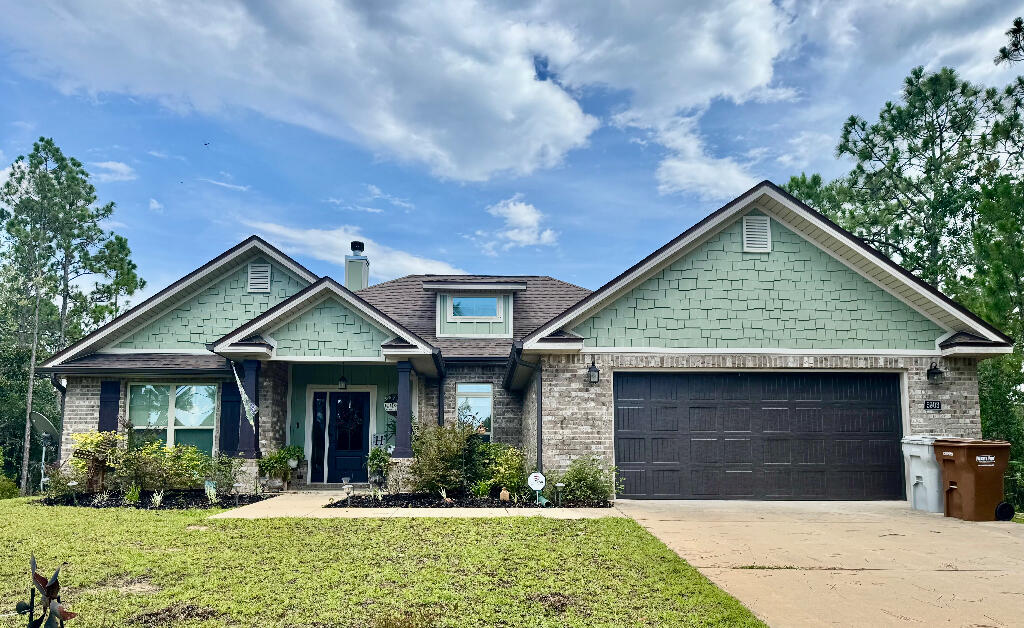 This stunning water view home is located in Gulf Breeze, FL. Location is desirable and is tucked between Navarre and Pensacola Beaches which are just minutes away. There is a large fenced in private backyard that is surrounded by trees . There is a large shed for optimal storage. There is a covered lanai with a patio out back which is perfect for watching birds, butterflies and bunnies which are plentiful. The family room has a large floor to ceiling wood burning fireplace that is perfect for those chilly winter evenings. No need to worry about power outages with this solar powered home with a backup Generac.
