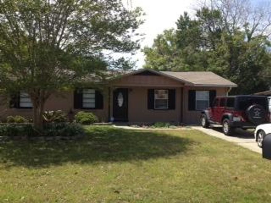 Four Bedrooms, 2 baths, two living areas with an open concept. All tile or wood laminate flooring. The only room that has carpet is the master. This home has been remodeled. Open concept in the dining, living and kitchen area. The master suite and bath are on the right side of your living room. The other 3 bedrooms and bath are on the other side of the home. When you are walking from your dining area through the French door to the back of the home you have another room Great for a play room or a man's cave. The back yard is almost a 1/4 of an acre. Plenty of room to add what ever you want to add. Storage shed great for storing lawn equipment or tools.