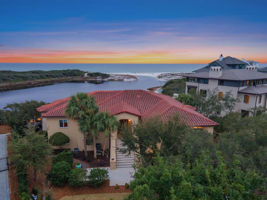 133 Sienna Court is a rare coastal retreat, perfectly positioned on the tranquil shores of Little Redfish Lake with sweeping views that stretch across both the lake and the Gulf. Nestled within the exclusive, non-rental community of Redfish Lane--just off Scenic Highway 30A--this property offers a unique combination of privacy, natural beauty, and direct access to a private dock and deeded beach walkover, all within one of the Emerald Coast's most desirable settings. The home's thoughtful design centers around an expansive open floor plan that connects the living, dining, and kitchen areas into one seamless, light-filled space. Soaring ceilings and walls of windows invite in natural light and showcase the home's extraordinary water views from nearly every angle. The main living area includes built-in shelving, a gas fireplace, and multiple points of access to the wide covered porches that span the back of the homeideal for outdoor dining, morning coffee, or taking in the breeze off the lake.

The kitchen offers ample cabinet space, a large center island, and a layout that opens effortlessly to the living and dining areas, making it perfect for gathering. The spacious primary suite is tucked away for privacy and features direct lake views, a walk-in closet, and an en suite bath with dual vanities and a soaking tub. The lower level includes additional guest suites, one of which features its own kitchen, dining area, and living roomideal for extended family, guests seeking extra privacy, or even a multigenerational living setup. With separate entrances and generous square footage, these suites offer comfort, flexibility, and a sense of independence within the home.

Architectural details, wood flooring, and thoughtful built-ins add character, while the home's multiple porches and balconies encourage connection to the peaceful natural surroundings. Though well maintained, the property also presents an exciting opportunity for personalized updates or renovations that could elevate it to a truly one-of-a-kind luxury retreat.

Whether you're looking for a full-time residence or a second home tucked away from the bustle, 133 Sienna Court delivers coastal living at its most peaceful and picturesquewith the rare bonus of both lakefront tranquility and easy access to the white sand beaches of 30A.