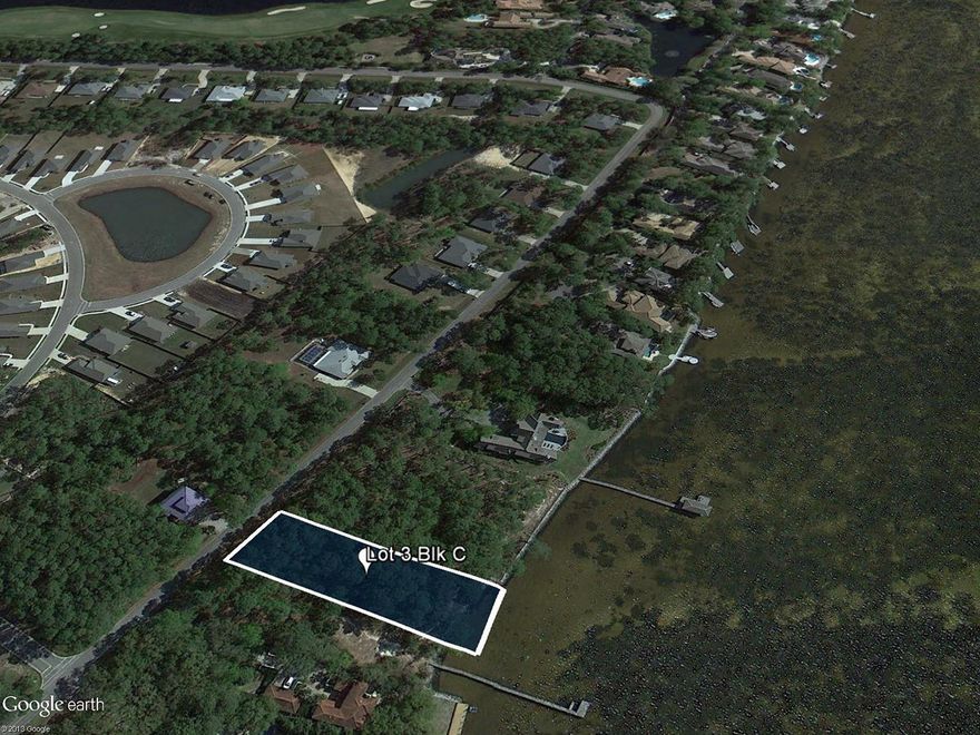 This Bayfront estate lot in the Driftwood Estates neighborhood of Santa Rosa Beach offers approximately .76 acres and 93 feet of waterfront, allowing it to accommodate almost any style structure. Its variety of mature trees will imbue a home built here with instant Southern charm. A seawall and rip-rap are in place and a pier or dock has been permitted. This lot has also been perk tested, and is clear for building.