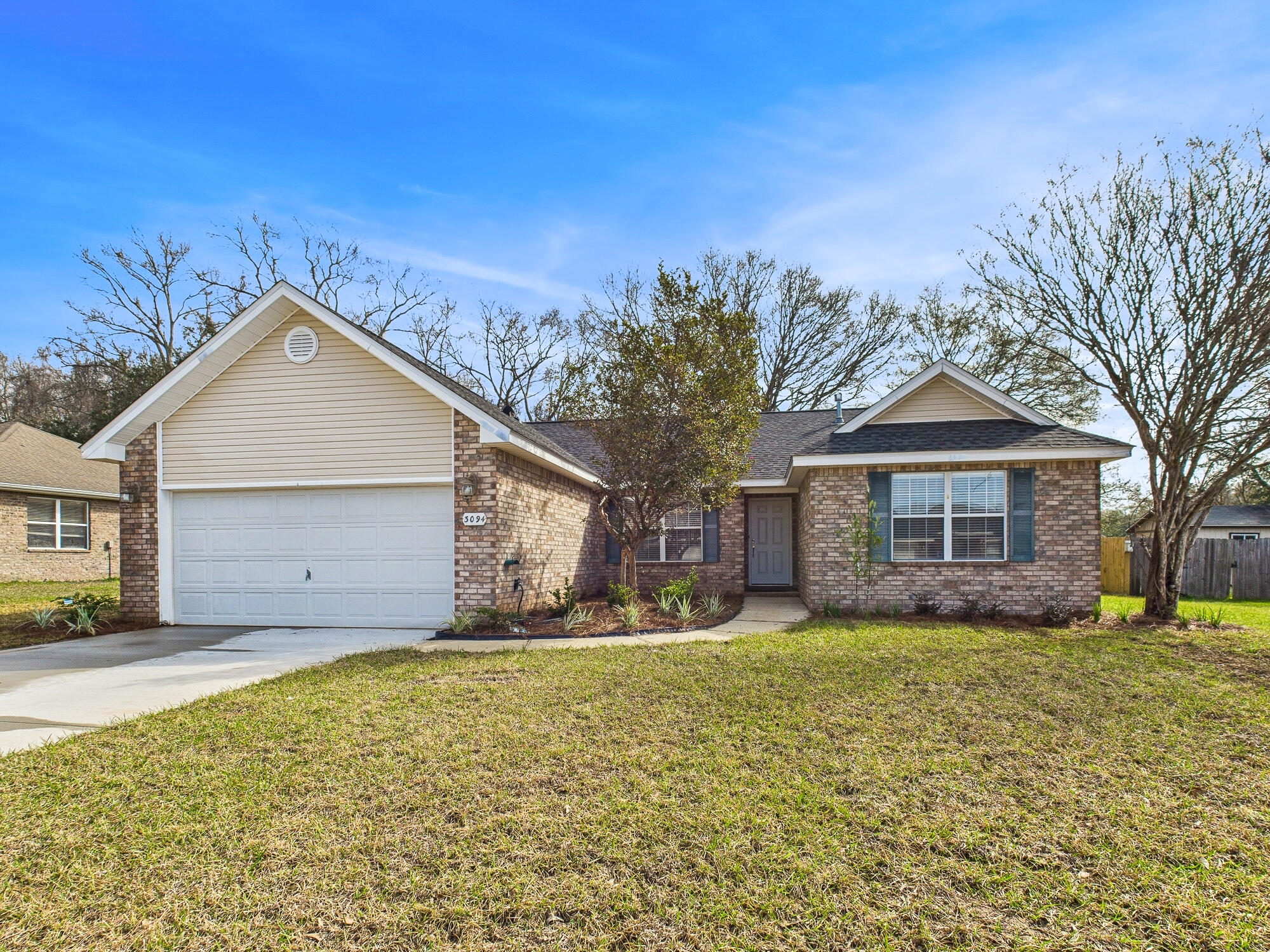 Discover this beautifully updated 4-bedroom, 2-bath home in a prime Crestview location! Nestled just 1.5 miles from Crestview High, 1.5 miles from Davidson Middle School, and 1.1 miles from local shopping, convenience is unmatched. Enjoy brand-new vinyl plank flooring in common areas and plush new carpet in bedrooms. The kitchen boasts a new refrigerator and a new stove top oven. Step outside to a freshly landscaped yard with a cozy fire pit, perfect for relaxing evenings. A spacious 2-car garage provides ample storage, and the roof was replaced in November 2024 for peace of mind. Don't miss this move-in-ready gem--schedule your showing today!
