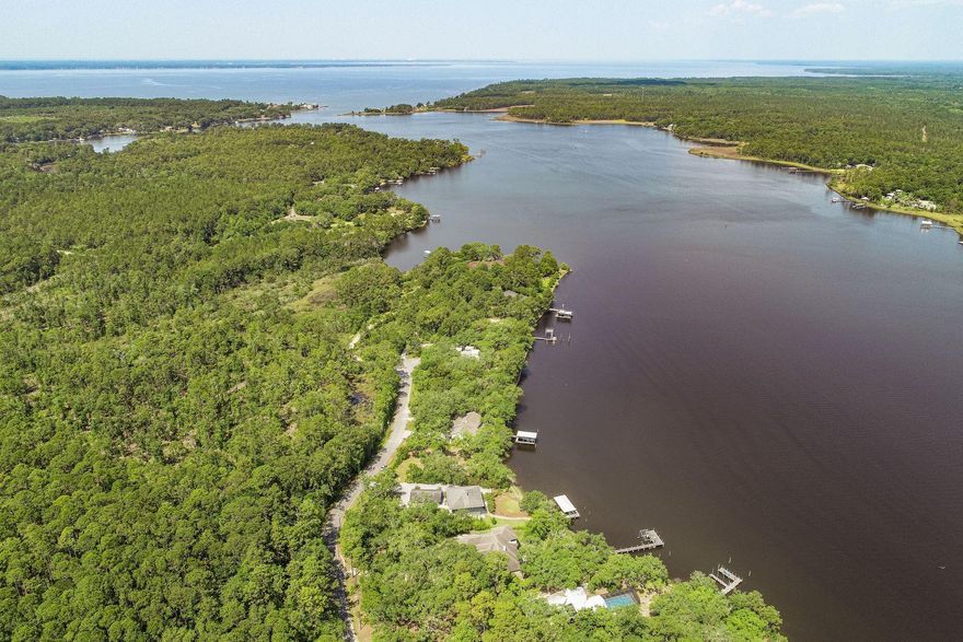 Rare Holly Point Road lot at 0.46 acre and 90 feet of frontage on LaGrange Bayou. Located just north of the 331 bridge. Lot is cleared with large oaks. Two minute boat ride to the open bay. Close to a full service marina.