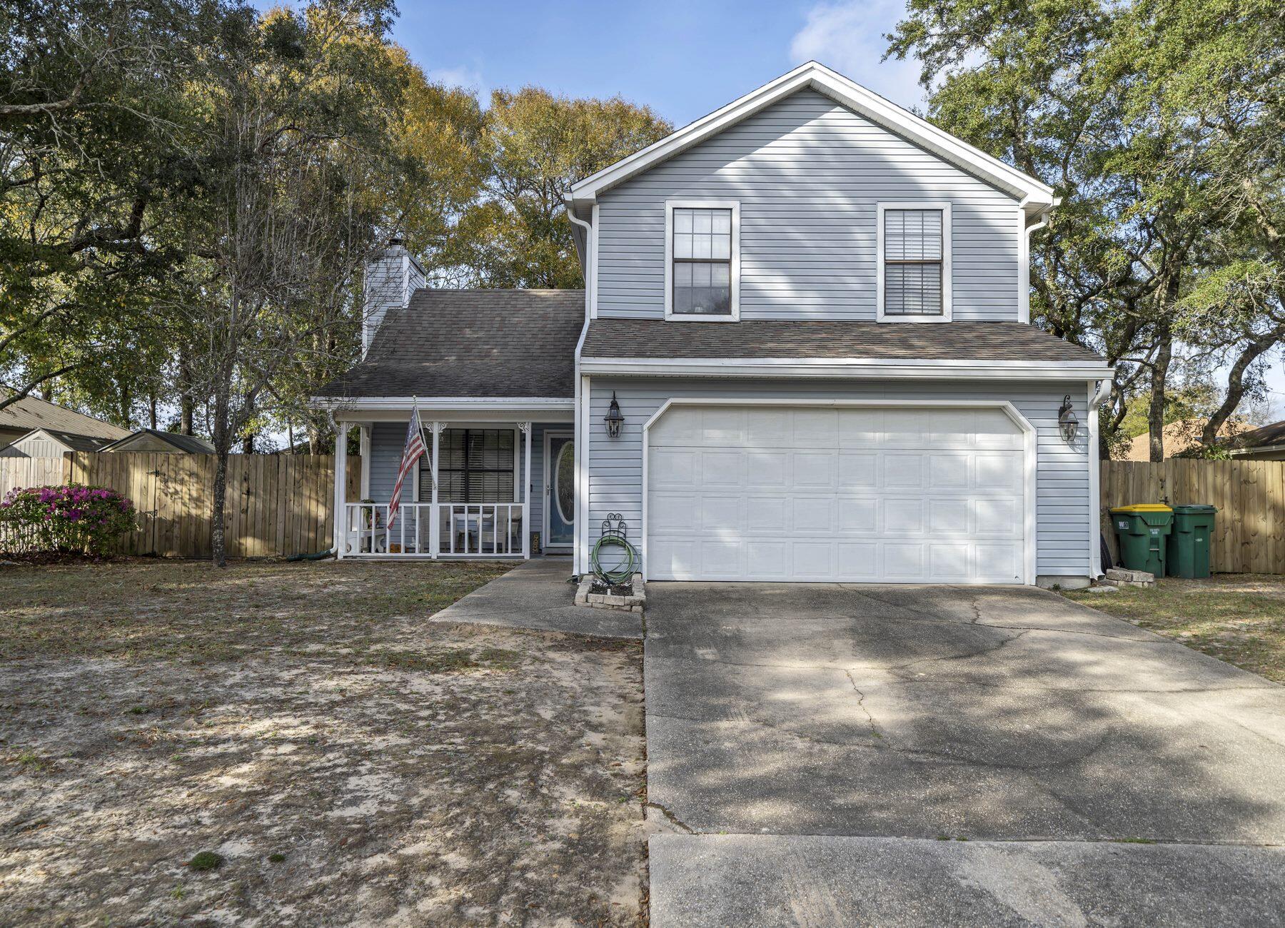 AVAILABLE... May 1, 2023. 3bd/2.5bth located in the heart of Niceville, near Niceville High School and within walking distance to Lions Park! As you enter the front door you are greeted by the vaulted beamed ceilings with a wood burning fireplace and new vinyl plank flooring. Kitchen features white cabinets and new granite counter tops with a classic white subway tile backsplash. The Dining Room overlooks the back yard which is fenced. The spacious upstairs Master Bedroom has plenty of room for all your furniture. The half Bath and Master Bathroom have both been updated with new countertops. NO smoking and pets allowed upon approval with a non-refundable pet fee. 600 minimum FICO credit score required in addition to meeting additional rental criteria.