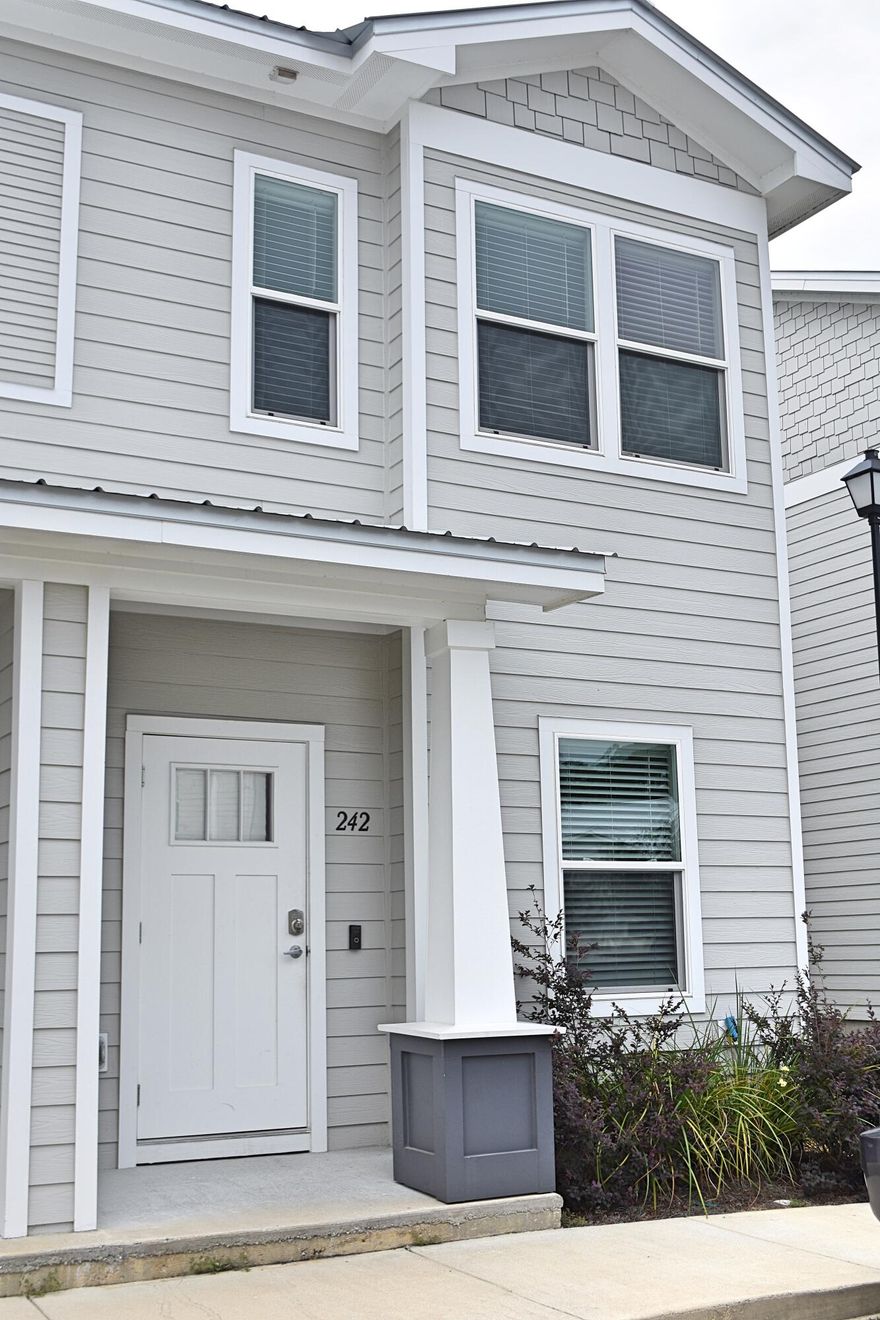 END UNIT! Well maintained 3 bedroom, 2.5 bath end unit in the Verandas of Freeport. Luxury Vinyl Plank flooring throughout. Living space encompasses the first floor in an open plan. Off the kitchen is a large screen porch to enjoy the outdoor living. The kitchen features an Island sink, Stainless steel appliances, and quartz counter tops. All three bedrooms are located on the second floor along with two bathrooms. Washer/Dryer included. This is an end unit with windows along exterior wall to provide natural light. Interior units do not have this feature! Unfurnished unit Centrally located in Freeport and nearby Freeport Schools. Easy travel to Eglin Air Force Base.