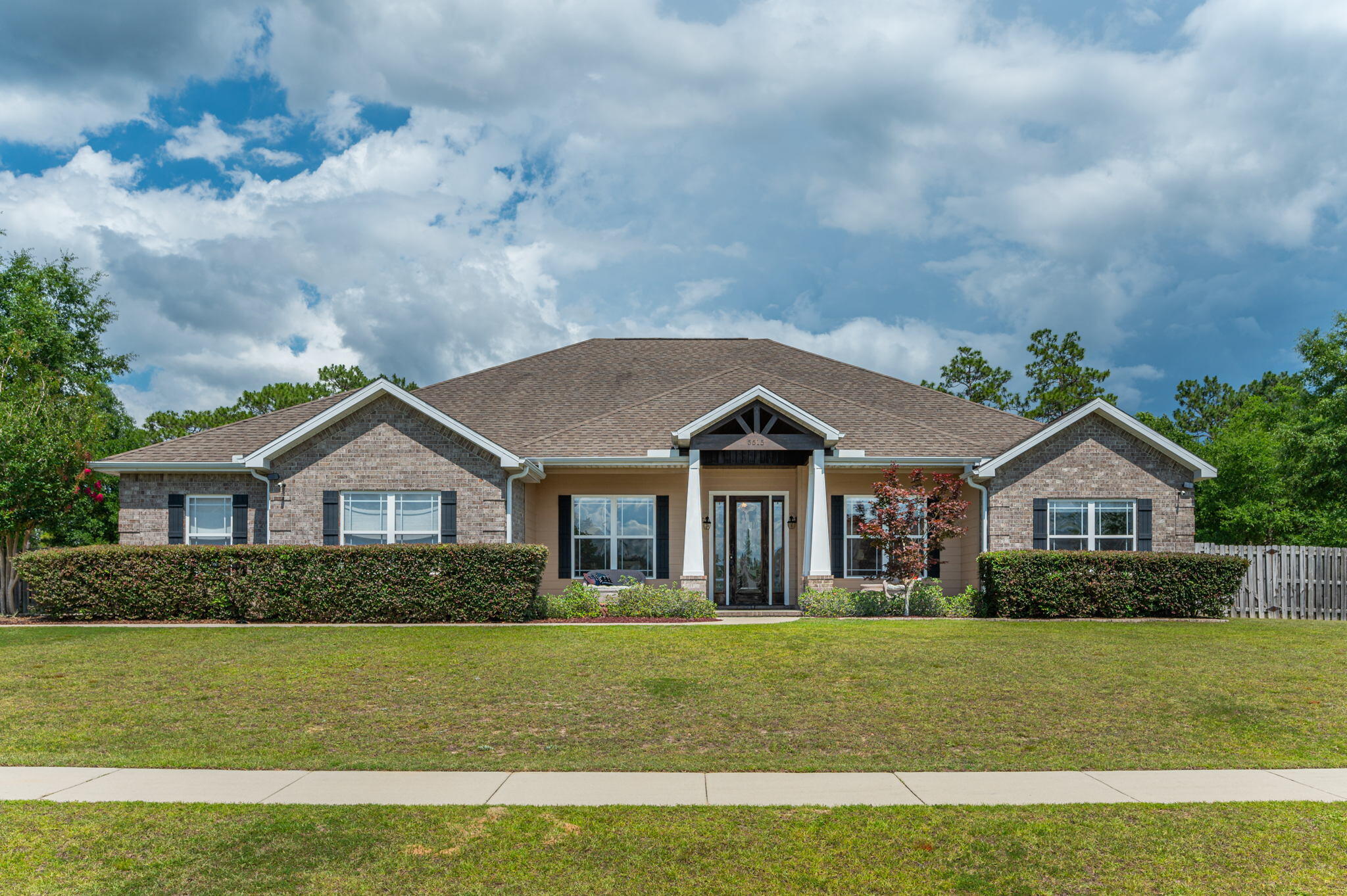 You MUST see this pristine 5 bedroom, 3 bathroom custom home! No upgrade was spared inside or out.  Jaw-dropping open floor plan with large kitchen, granite countertops, custom glazed cabinetry, touch-less faucet and new appliances including: gas stove with convention oven and air fryer, dishwasher, microwave and double refrigerator.  Warm up to the peaceful ambiance of the living room featuring fireplace with built-ins.Master Bedroom and bathroom is luxurious with free standing tub, tiled shower and huge closet.  18 X 36 screened in gunnite pool w 12 multi-colored light settings, gas heater, separate electrical panel for pool equipment, removable child safety fence.  New complete HVAC system in 2019.  Whole home water filtration system.  Natural gas hook-ups for dryer stove, pool heater