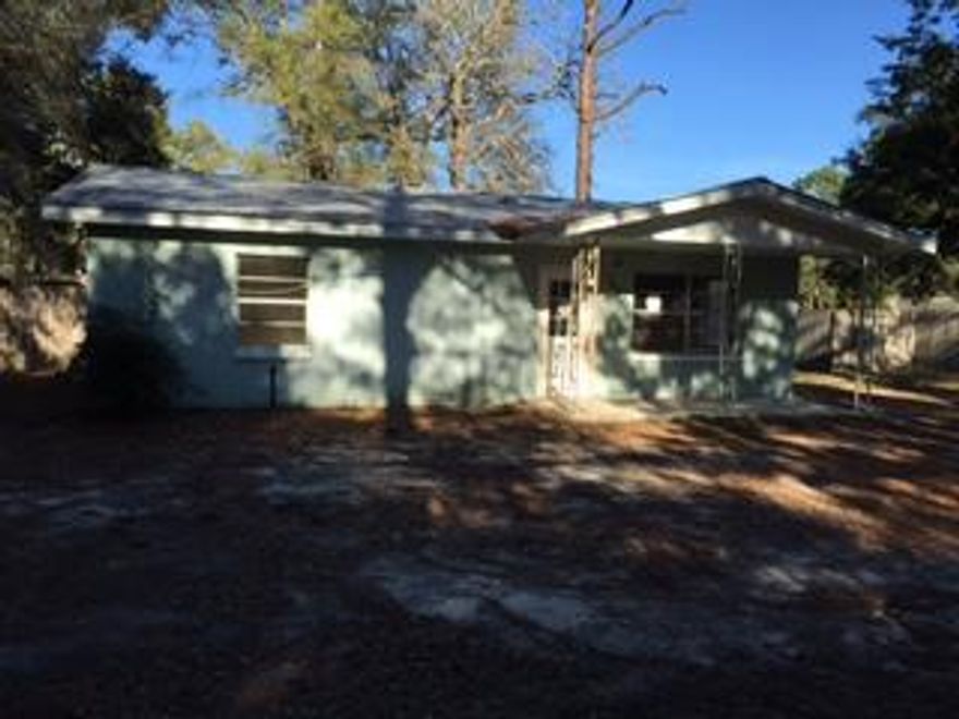 Adorable little house with huge yard! This home has tons of potential! Freshly painted walls, ready for new carpets/flooring. 2 Bedrooms/1 Bathroom. Lots of great yard space in a quite neighborhood. Property being sold ''As Is.'' Please use ''as is'' purchase agreement for all offers.