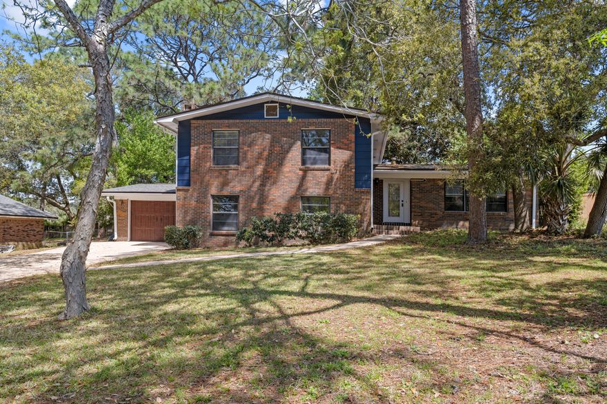 Come check out this awesome home in Poquito Bayou minutes away from the community boat ramp, docks and park!This home has 5 total bedrooms and 3 full bathrooms.  4 bedrooms are upstairs and there is 1 bedroom downstairs with sliding doors that lead out to a private deck. As you walk in, you can walk straight into the kitchen or to the right will be the living room space that then leads you to the formal dining room around the corner that also has sliding glass doors leading out to the large serene backyard.  Downstairs features a huge family room/den complete with a fireplace that also leads to the garage.