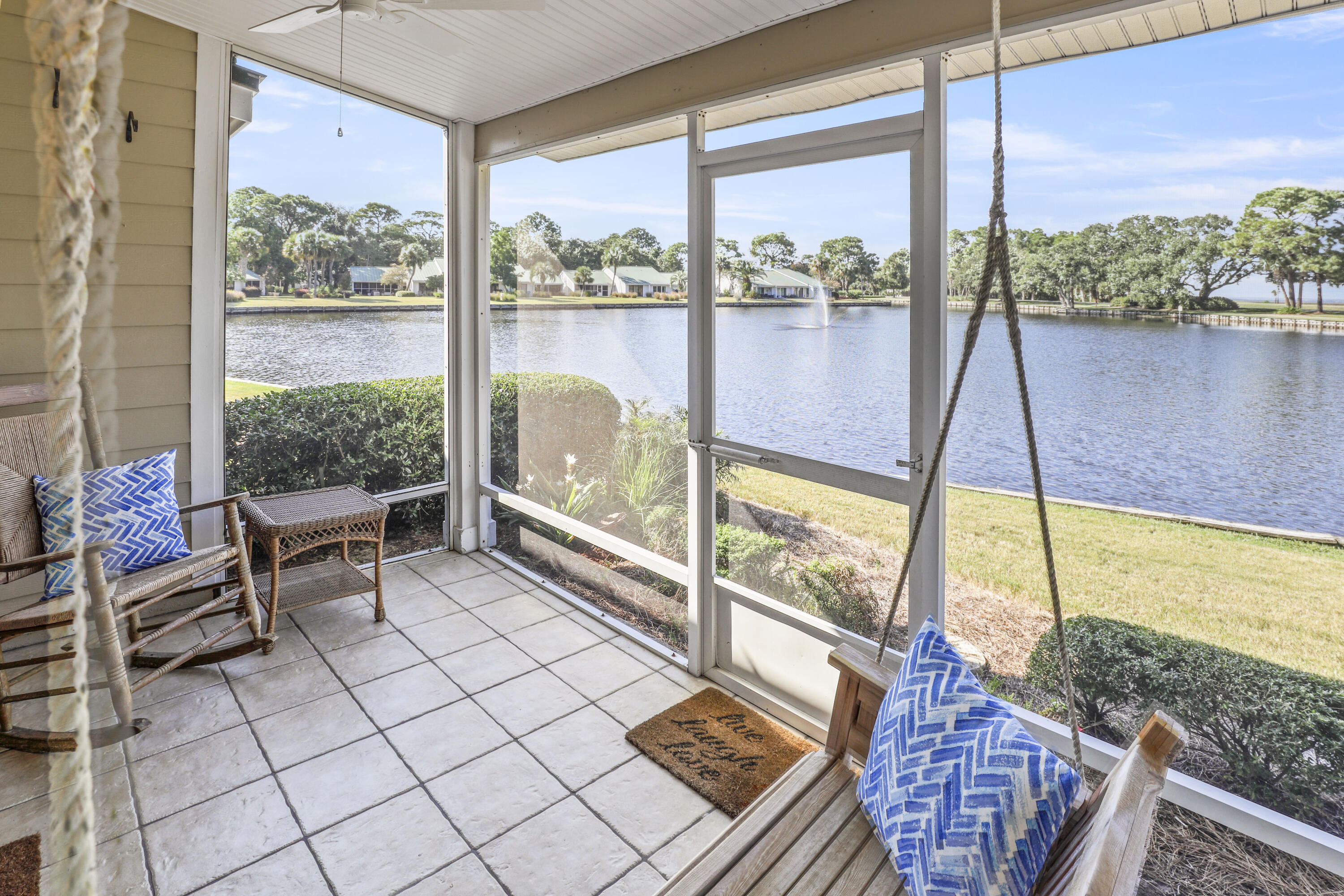 Available for 12 month lease! This fully furnished 2-bedroom, 3-bath townhome offers beautiful views of the lake and marina from the screened-in patio. New carpet in bedrooms and new LVP flooring throughout entire home! Fully updated bathrooms, new paint & lighting throughout! This beautiful townhome is located within the gates of Sandestin Golf & Beach Resort and is just a short walk or drive to The Village of Baytowne Wharf with fantastic dining, shopping, and entertainment options.