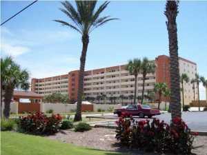 ISLAND LIVING AT IT'S FINEST!! 3RD FLOOR End UNIT! Surf Dweller's units boast 435ft of beach frontage and lot of square footage for the price. Enjoy breathtaking views of the sunsets, emerald green waters and sugar white beaches from your very own 30ft X 8ft balcony. Spacious living room with sliding glass doors leading out to the balcony. Dining area opens into the living are with plenty of room to entertain. Cook's delight kitchen with lots of counter space and cabinets and even a window over the sink for a homey feeling. Laundry room off the kitchen with a full size washer and dryer. Master bedroom has sliding glass doors leading out to the balcony. Additional bedroom is very spacious. Lots of amenities including a 25ft x 50ft heated pool, tennis court and undesignated covered parking.