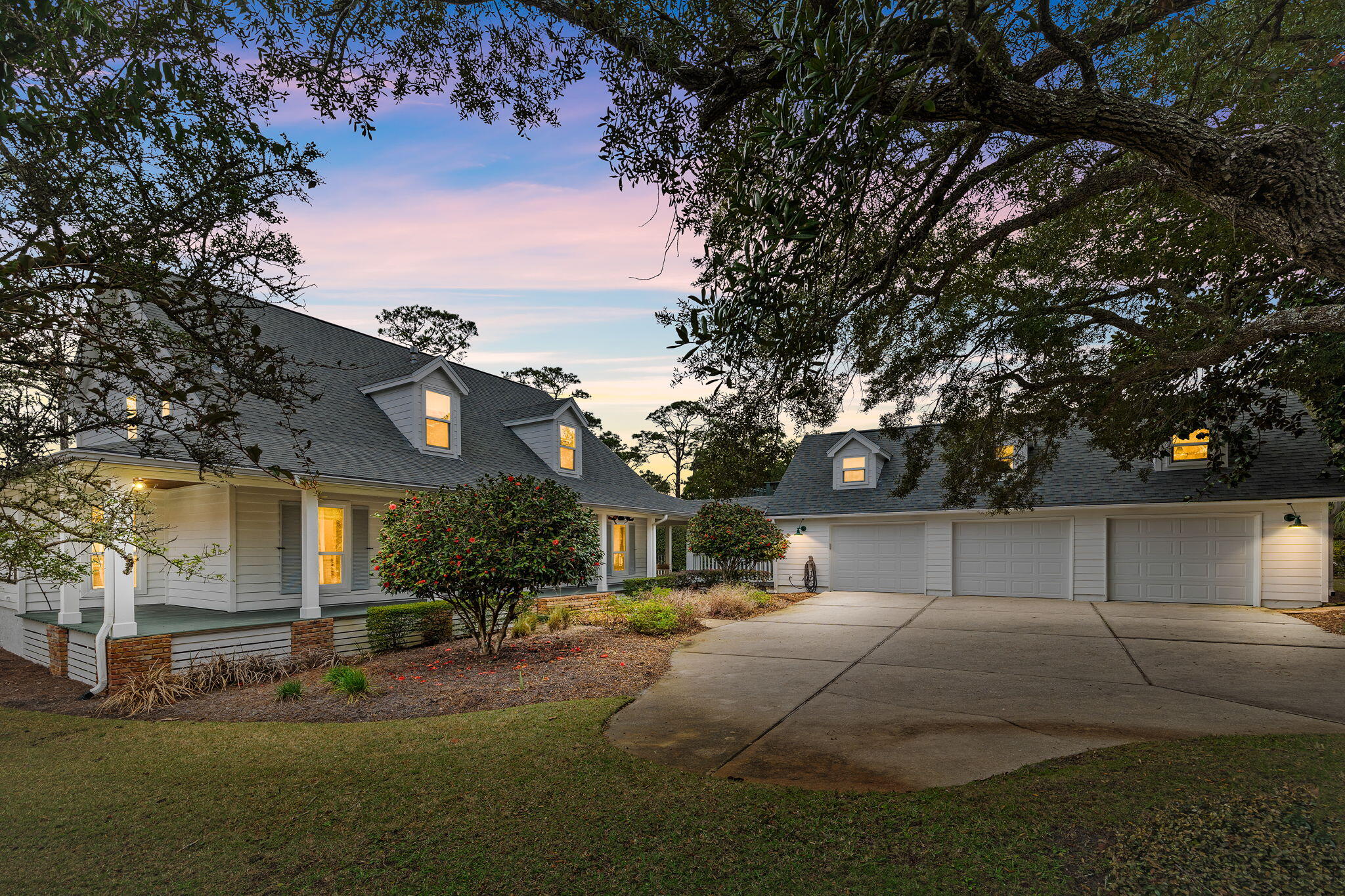 Welcome to Beachfront living at Parish Point. This is a one acre hidden gem property in the private and secluded Santa Rosa Sound. The property consists of main house featuring 4 bedrooms and 3.5 baths while the detached garage/guest house includes a 3 car garage with second floor guest house style in-law suite which consist of 1 bedroom/living,1 bath and kitchenette. The house also has expansive 20 foot ceilings in the living room with a cozy gas fireplace where you can enjoy the waterfront view beyond the picturesque windows. These breathtaking views frame the salt water swimming pool and Santa Rosa Sound. The property has its own private beach and renovated private dock house with boat lift. The backyard is entertainment ready with beautiful landscape lighting, trees & dockside shower.
