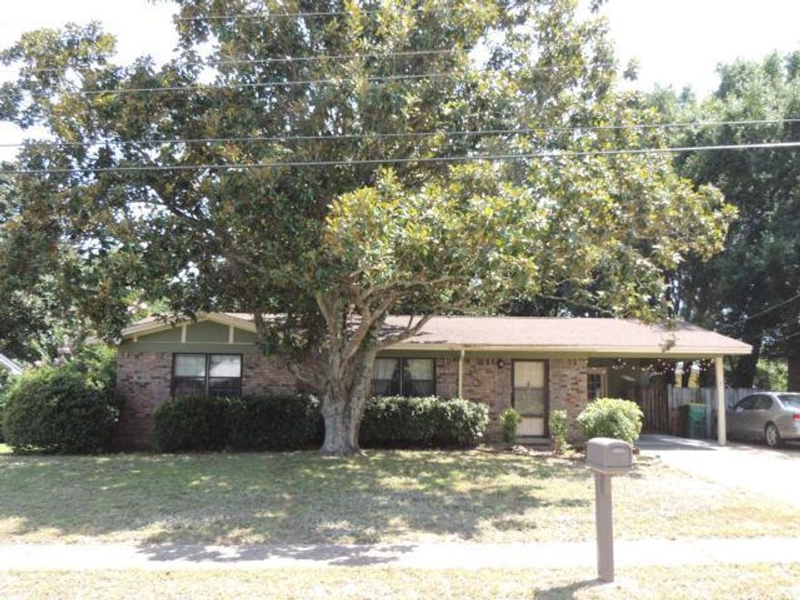 Terrific close in location in Eastern Mary Esther. The home is light and bright and features a wood burning fireplace in the living room. The brick construction makes for low maintenance of the exterior. Several large magnolia trees in both the front yard and back yard shade the home as well as add to the landscaping. In the back yard is a large detached shop and garage, perfect for projects and a great ''Man Cave'' The location of this home makes it perfect for either a first home or a down size home. Schedule your showing soon.