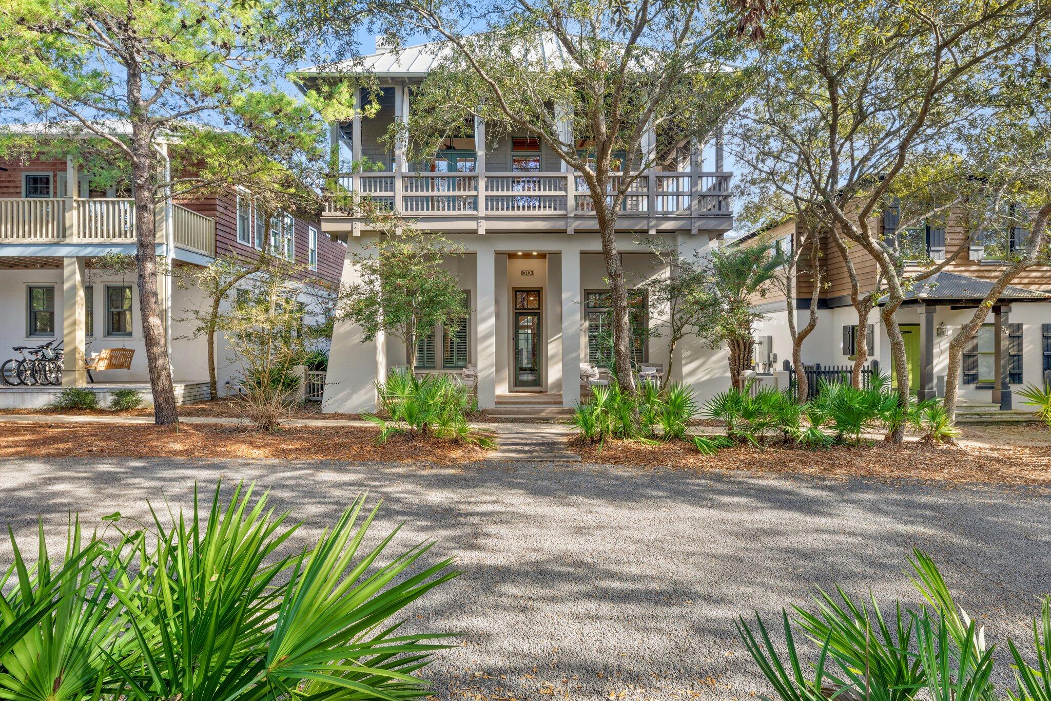 Producing over $250K in actual rental income for 2022 & with over $192K YTD for 2023, 313 East Water Street is a top rental investment property in Rosemary Beach. Located on south side of 30A, this stunning four bedroom home is an entertainer's dream with a private heated pool, hot tub & GULF VIEWS! By the pool, there is a complete outdoor kitchen with a built-in gas grill, granite countertops, ice maker & mini-fridge. And there is a large outdoor fireplace, an amazing luxury for the colder, off-season months. The interior architecture delivers an iconic design. Gorgeous beams are placed throughout delivering the West Indies architecture Rosemary Beach is originally known for.