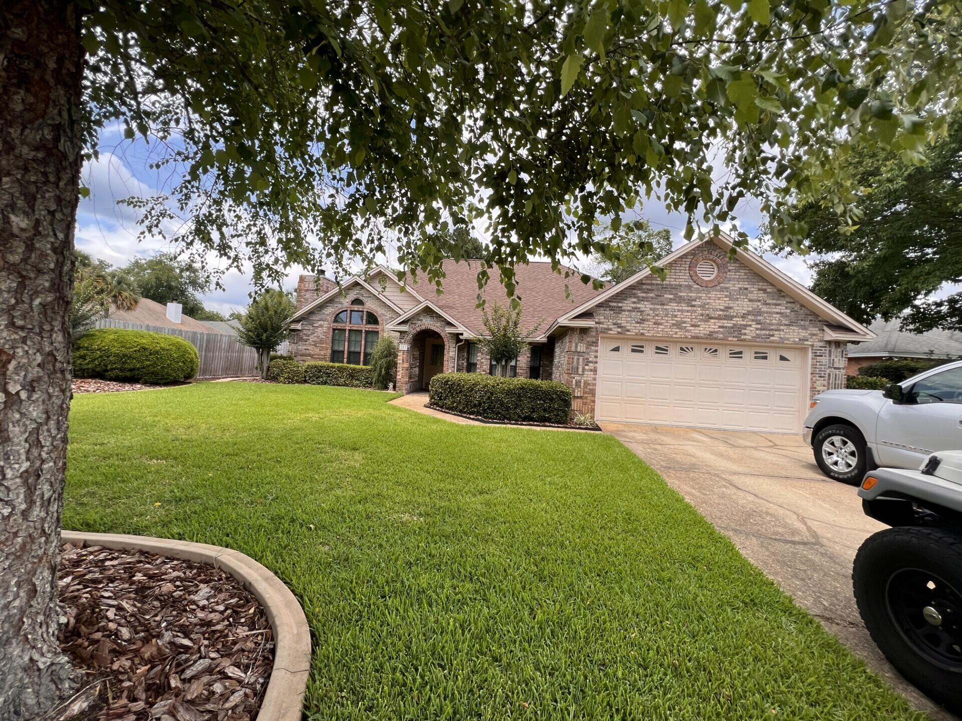 Beautiful all brick home with a NEW ROOF, NEW interior and exterior A/C UNITS and a Gunite inground pool.    This is a Great home with an open floor plan.  All windows have been replaced with exception of the office.  New PVC flooring in the family room, hallways and foyer.   This home has so many upgrades, granite countertops installed, ceiling fans installed in all the rooms, each bedroom has walk-in closets, garage floor sealed and painted, double insulation in roof and fresh paint throughout the home.  You will love the wood burning fireplace for cozy nights and hanging the stockings at Christmas.  The master bath has double vanities, separate shower with seat. a marble jacuzzi tub for relaxing baths and a very large master closet. If you like entertaining, this is the house for you.