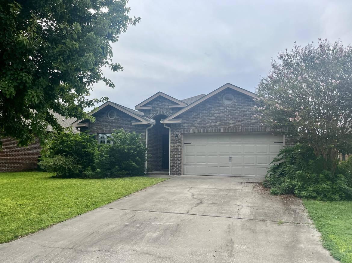 Stunning all brick home in much sought after Waterford Sound. Located between Navarre & Gulf Breeze, yet only 10-15min to the beautiful beaches. This 3 bedroom 2 bath home features a separate office with French doors, high ceilings, plantation shutters, tray ceilings & crown molding, upgraded 42'' upper cabinets in kitchen and laundry, and stainless appliances. Recently replaced the carpet and vinyl flooring. Master offers tray ceilings w/crown molding & a master bath that features a large garden tub, separate shower, double vanities and huge walk in closet. The exterior offers a large covered back porch, spacious back yard, sprinklers, and a fully fenced yard. For more info, call Navarre Beach Realty at 850-936-0701. No cats, but dogs may be considered with $350 nonrefundable pet fee.