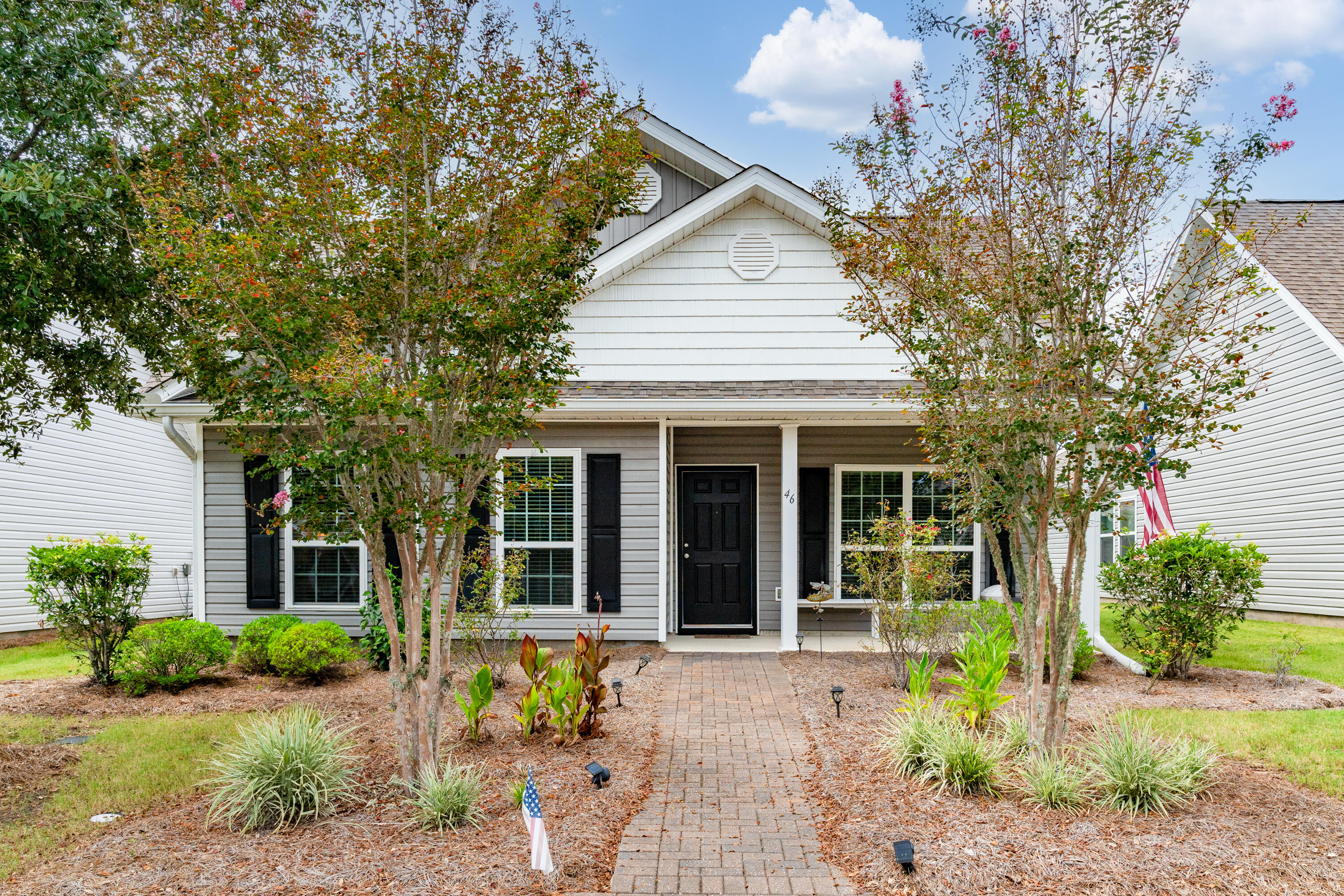 Enter Schooner Landing at Hammock Bay and feel at home! This incredible residence boasts a generously sized kitchen, offering ample counter space to bring your culinary creations to life. The spacious living areas are bathed in natural light and have been thoughtfully updated with newly installed flooring. Prepare to be astonished by the Master bedroom, where sunny views greet you each morning. The room is large enough to accommodate oversized furnishings, and the attached full bath provides a double vanity for your convenience. You'll also find a split floor plan, with secondary bedrooms that offer delightful sunny views of their own. Situated in the heart of Hammock Bay, you'll have access to a host of world class amenities that await your enjoyment. The lake Club is at your disposal offering a movie theatre and event space for memorable gatherings. Multiple resort style pools, pickleball, tennis and basketball courts beckon you to engage in a friendly competition. Your four-legged friend will thank you for the dog park, while miles of recreational paths ensure everyone can stay active. Stocked ponds and frisbee golf further add to the fun, and the Bay Club includes a dock where you can take in the breathtaking Bay views. Don't forget the food trucks, Props and event space on the green as well as the nearby Freeport Sports Complex. But the perks don't end there. Schooner Landing takes pride in its full landscaping program, ensuring that every yard is professionally maintained. This includes mowing service, watering with sprinkler system, exterior pest control services and regular refreshing of pine straw. Welcome to Schooner Landing at Hammock Bay, where comfort, luxury and extraordinary amenities await you.