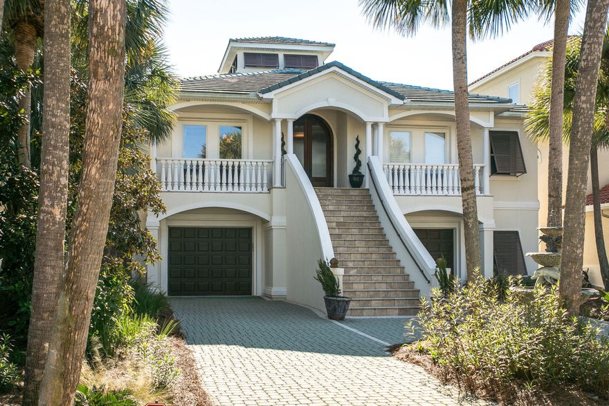 DIRECT VIEWS OF THE BEAUTIFUL GULF OF MEXICO! Step into this custom-designed beachside home & enjoy sweeping, unobstructed views of the Gulf of Mexico from every room. In this luxurious home, you will find custom finishes throughout, the foyer & dining have custom Venetian crystal chandeliers that previous owners had made in Venice, Italy, & the dining room has Chihuly blown glass art as a focal piece. The grand living space has 10-23' ceilings, gas fireplace with remote controlled fire logs, custom cherry wood finished cabinetry in the kitchen & beautiful granite countertops throughout in the kitchen & in the elegantly designed spa-like bathrooms. Custom draperies & fixtures convey. This home has an Elevator! All information including square footage and dimensions to be verified by buyer This home offers smart home wiring  and is built with solid concrete block materials for a solid foundation. This is truly an exquisite home with fine finishes! Come see for yourself! Please check out the virtual tour in the listing...