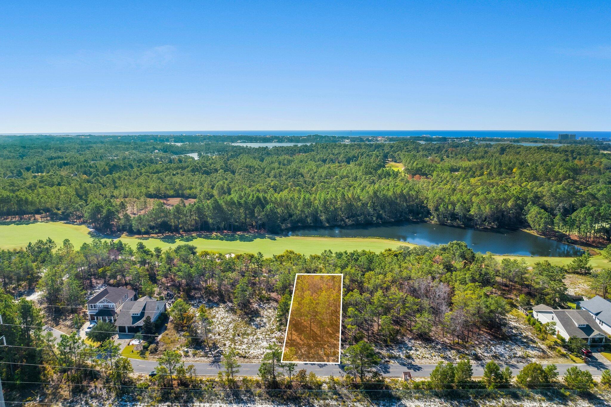 Ready to build in Wild Heron? This is the only golf course lot available on Salamander Trail and it has previously approved plans that convey with purchase. Plans offer a beautiful 3 bedroom, 3 bath, 1878 sq ft, custom designed home by J Michael Hunnicutt the overlooks the 3rd Fairway of Sharks Tooth Golf Course. Architectural plans, ARB Fees, Survey and Landscape Plans have previously been paid. Wild Heron offers resort style amenities and is completely private behind the 24 hour guarded gate. Don't let this opportunity pass you by.