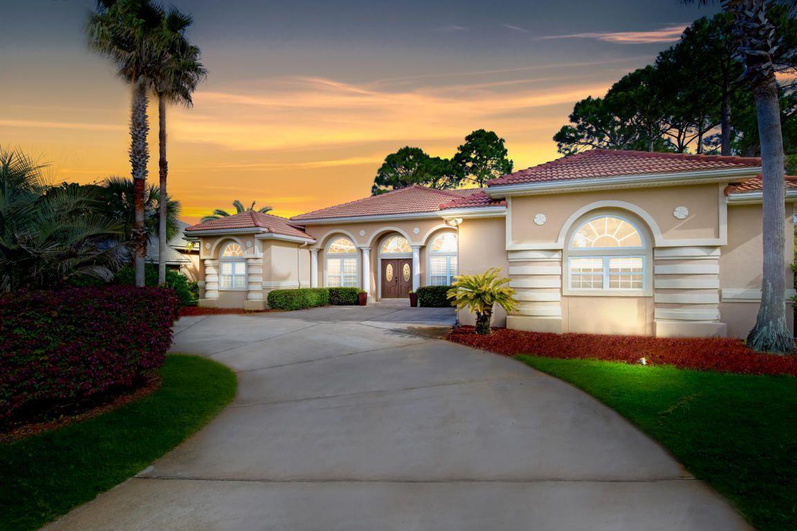 From the very beginning you will realize this beautiful, large Golf Course home that is perfectly positioned for Amazing Views of the 11th hole at Emerald Bay offers the greatest value for the price in the entire subdivision! Custom Built by renowned Builder W. Gargas Construction, this home has been updated with Sunburst Shutters, central vac, new lighting, and painted to give it a warm, casual, coastal feel. In addition, the home has been designed to allow the outside in with its large screened-in patio adjacent to several rooms for easy access. Enjoy experiencing a ''Great Quality of Life'' in a Gated Golf Course Community in a Superior location with the Emerald Bay pool, tennis courts, and low HOA Fees. Fruit trees outside producing both Ruby Red Grapefruits and Orange
