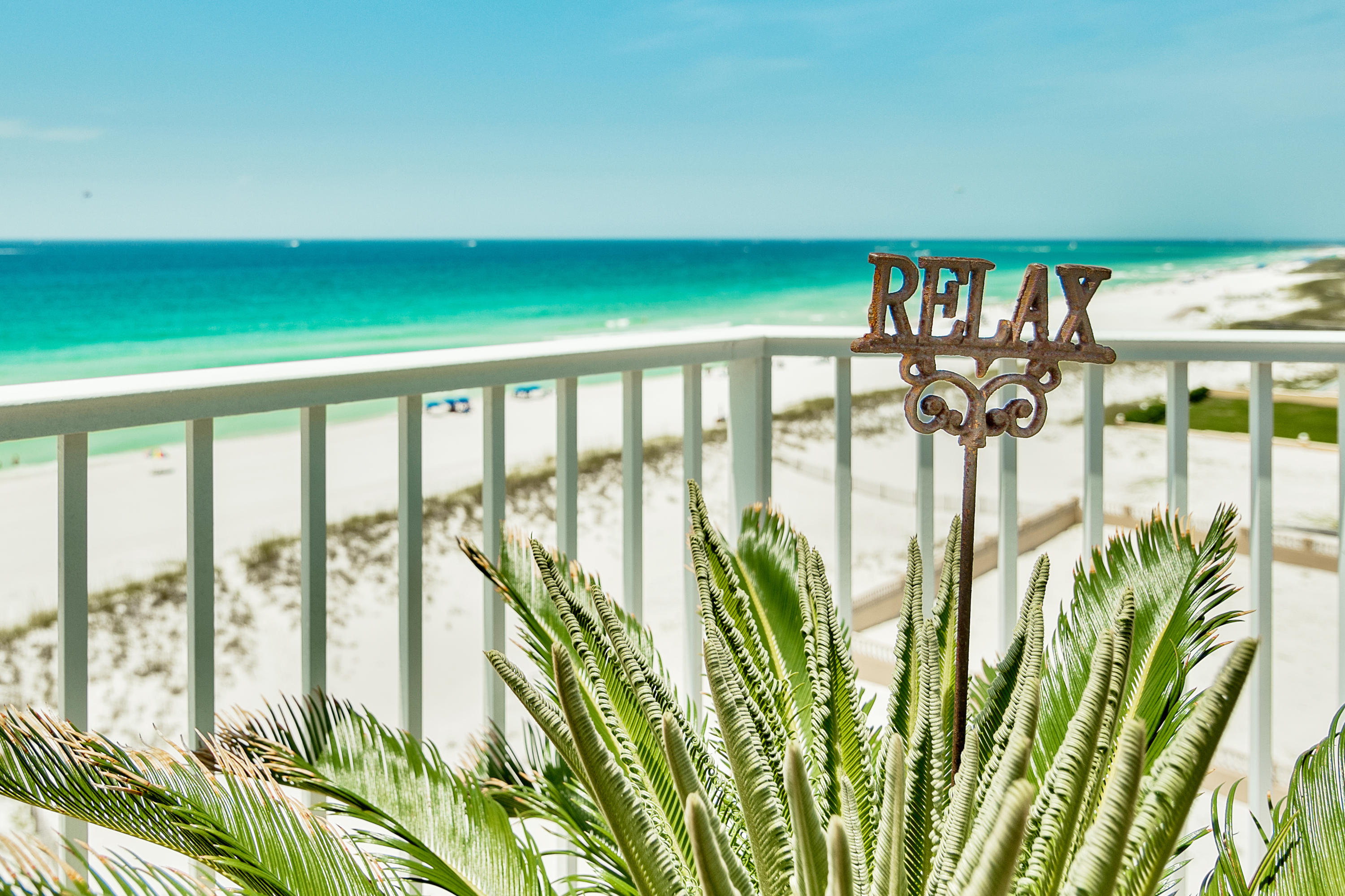 Fantasizing about a home that gives you views of a sunrise and a sunset? This pristine Martinique penthouse unit has breathtaking views of the gulf and the harbor. Expansive, panoramic views of the Gulf of Mexico greet you when you open the front door. The Martinique is one of the premier condo buildings in all of the Emerald Coast....very exclusive (only 10 units in all), private and protected (only 2 units per floor) and secure (security access code for entry gate, lobby door and elevator). This bright and airy home offers a large walk-around balcony...absolutely fabulous for entertaining, sunbathing, morning coffee, afternoon wine and watching the sunset. This home is flooded with sunshine and has a fireplace for those chilly evenings. Martinique has it own swimming pool and private