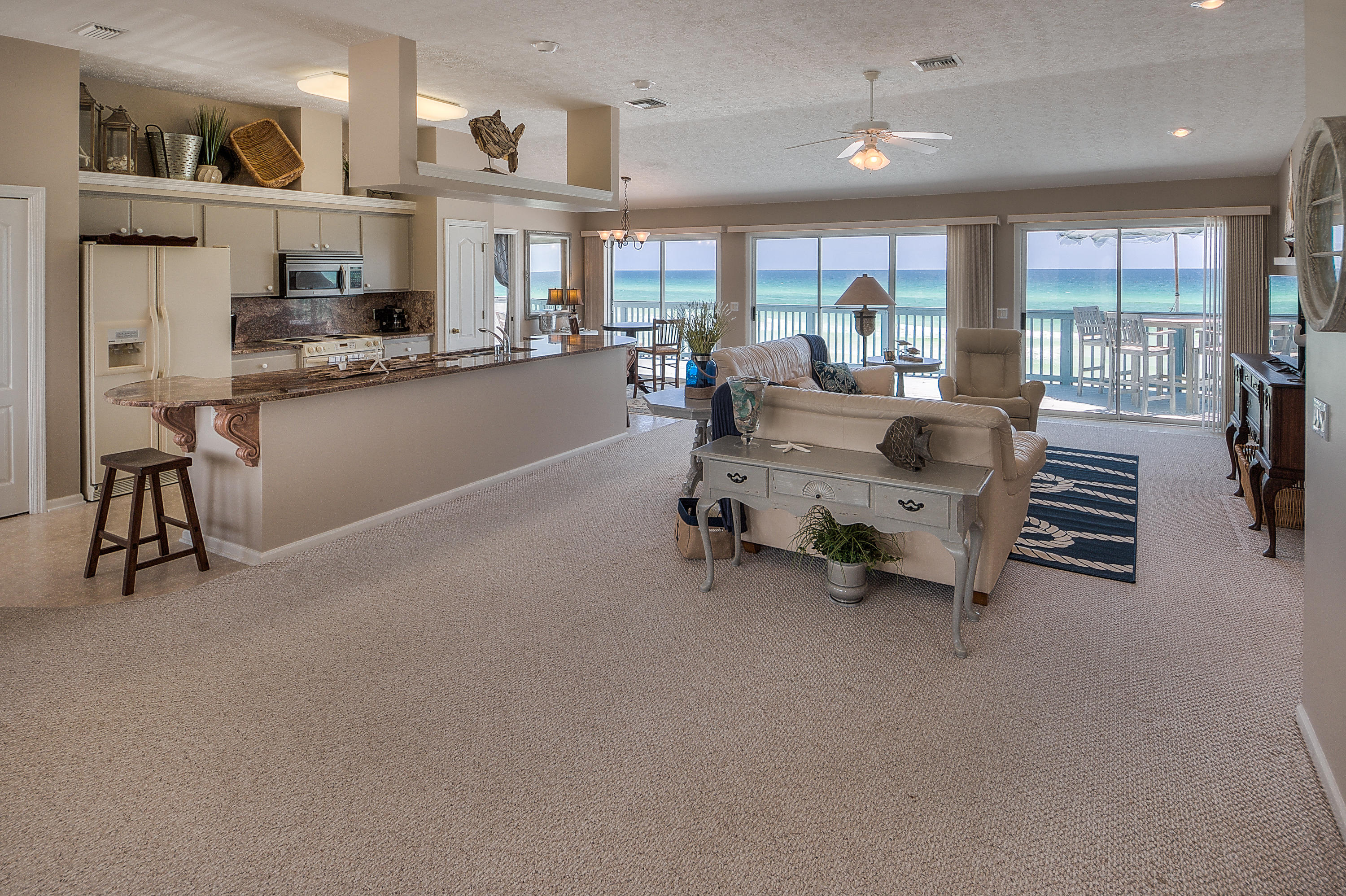 This Gulf-Front vacation home boasts over 1500 square feet of covered decking combined with over 500 square feet of open decking...all facing the emerald waters of the Gulf of Mexico! Recently renovated and furnished, this home offers four bedrooms and is rental ready! The home would be a perfect vacation home for a family or an investment. If you love outdoor living, this home is for you! 75 Fort Panic can be combined with 43 Fort Panic and 53 Fort Panic for a total of 225 feet of gulf frontage...a rare opportunity! Call today for more information or to schedule your appointment!