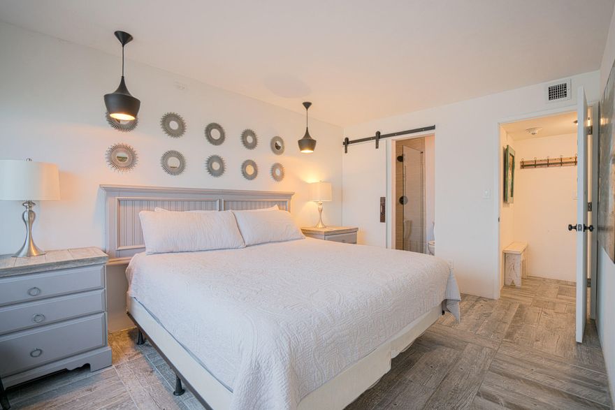 This Amazing Pinnacle Port A1-910 Condominium has been completely renovated with an industrial, modern dcor, featuring reclaimed wood finishes, furniture, and floors along with tracked barn doors, large screen TV in living room and both bedrooms, and an electric fire place in the living room. Kitchen features new stainless appliances and the views are amazing. You can see emerald green water and sugar white sand from most all rooms. You can also see beautiful Lake Powell from the king bedroom.First floor features a king bedroom with large flat screen TV, and hall bath with walk in shower. Proceed to the 2nd floor to find a beautiful view at the top of the stairs and an open floor plan with living and kitchen featuring new appliances and a breakfast bar. Brand new AC.