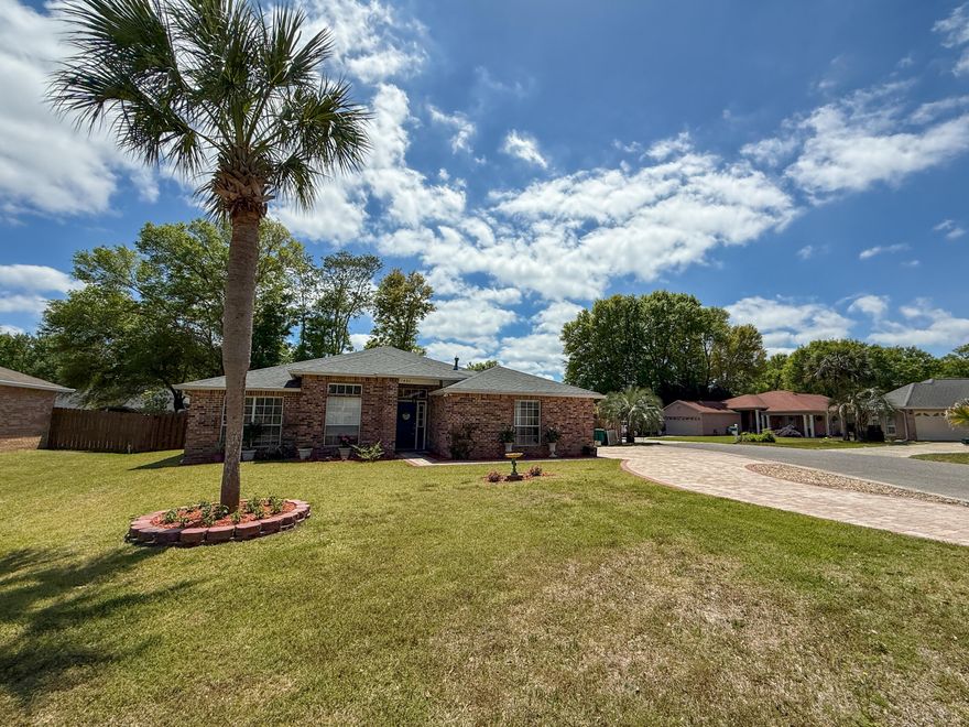 VA assumable loan 2.875% for VA buyers only!  Welcome to this beautifully maintained 4-bedroom, 2-bath custom brick home nestled on a quiet cul-de-sac in the highly desirable, gated community of Magnolia Plantation. With a split-bedroom floor plan, multiple spacious living areas, and thoughtful updates throughout, this home offers comfort, style, and convenience. Step inside to find light-filled formal living and dining spaces, perfect for entertaining. The great room features a cozy gas fireplace, custom built-in bookcases, and opens to a large eat-in kitchen with island, breakfast bar, and stainless-steel appliances. The oversized master suite offers a peaceful retreat with a large walk-in closet, dual vanities, jetted tub,and separate walk-in shower. Three additional bedrooms share a full guest bath and are tucked away off the formal living room for added privacy. Enjoy low-maintenance living with tile in wet areas and luxury vinyl plank flooring throughout the rest of the home. Other highlights include: Indoor laundry room, ceiling fans throughout, side-entry garage with large paver driveway and circle for additional parking, irrigation system, private backyard, a paver stone patio, and custom pergola. Located just minutes from Eglin AFB, the Mid-Bay Bridge, Destin's beautiful beaches, shopping, and A+ schools. Enjoy easy access to neighborhood amenities like the pool, marina, golf course, and tennis centerjust a short walk away. Community features a guard-gated entrance for peace of mind. Tenant-occupied: 24-hour notice required for showings. Don't miss your chance to own this incredible home in one of the area's most sought-after neighborhoods! NOTE: VA assumable option will need to bring about $235K to close the gap; current payment is $2,150 per month.